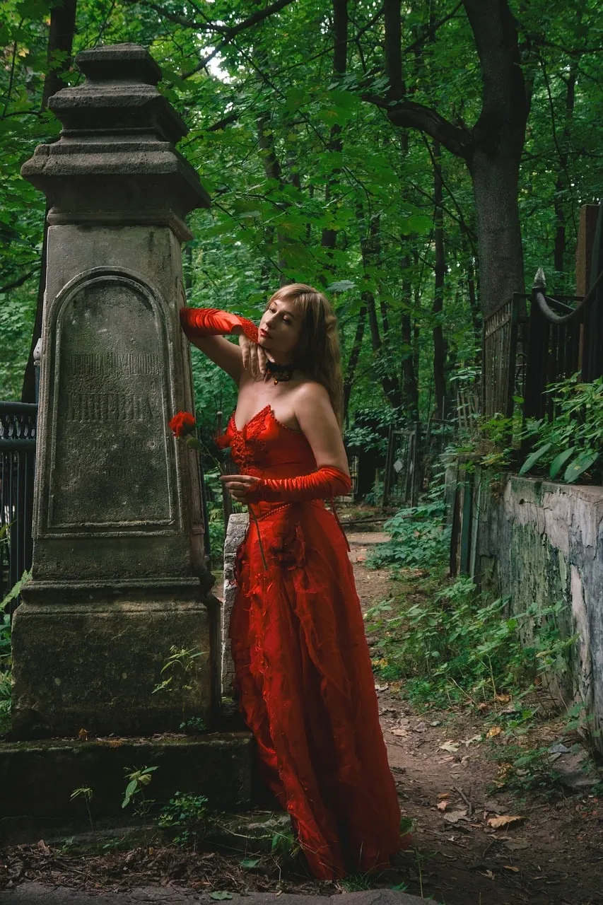 Enchanting Gothic Beauty Amidst Forest Tombs