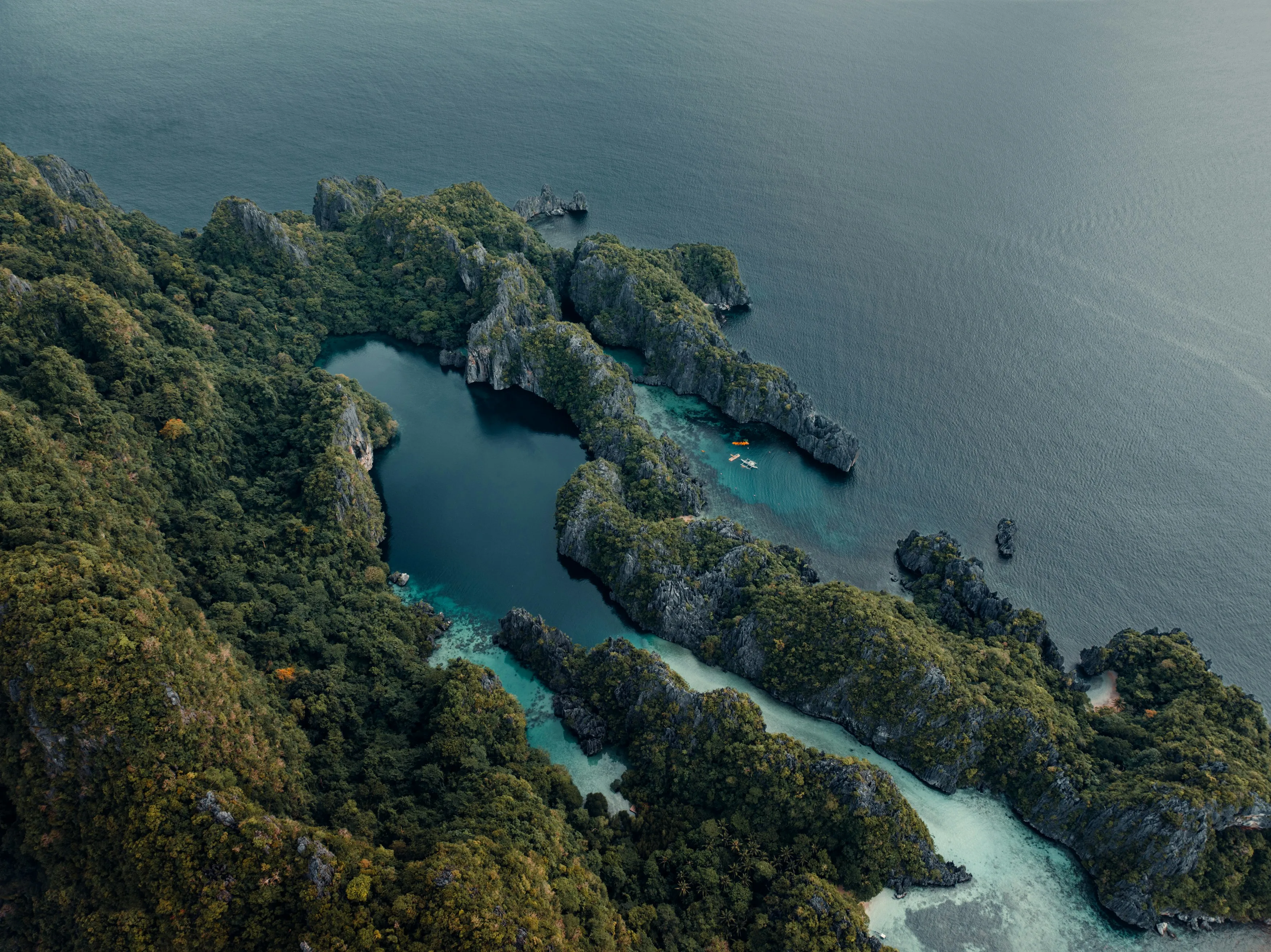 Dramatic Aerial View: Lush Green Islands Amidst Pristine Ocean