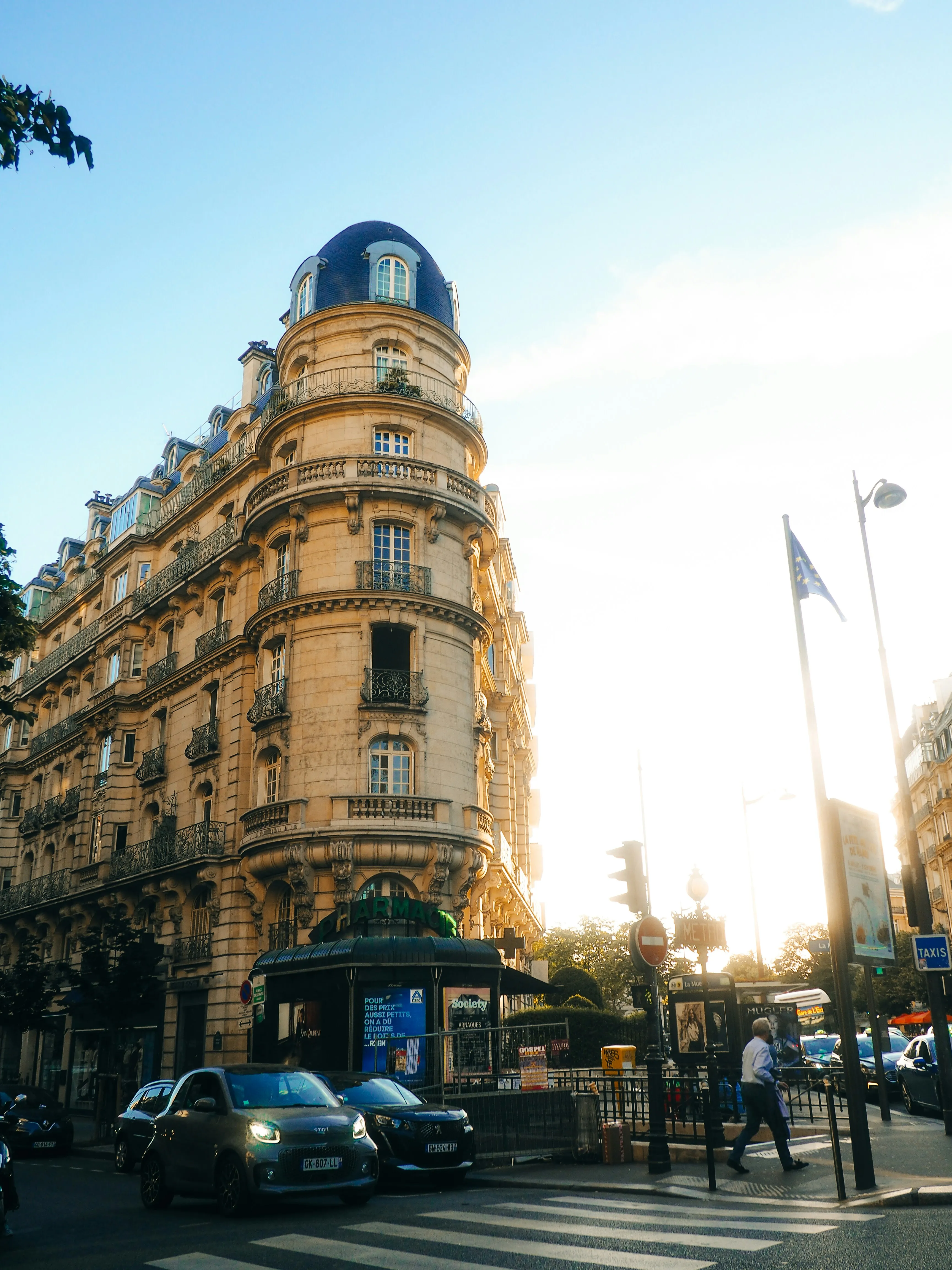 Stunning Parisian Architecture: Blue Dome Against Bright Sky