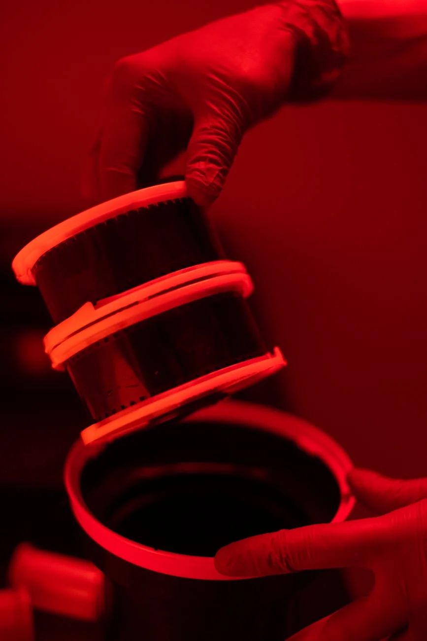 Darkroom Magic: Developing Film Under Red Light