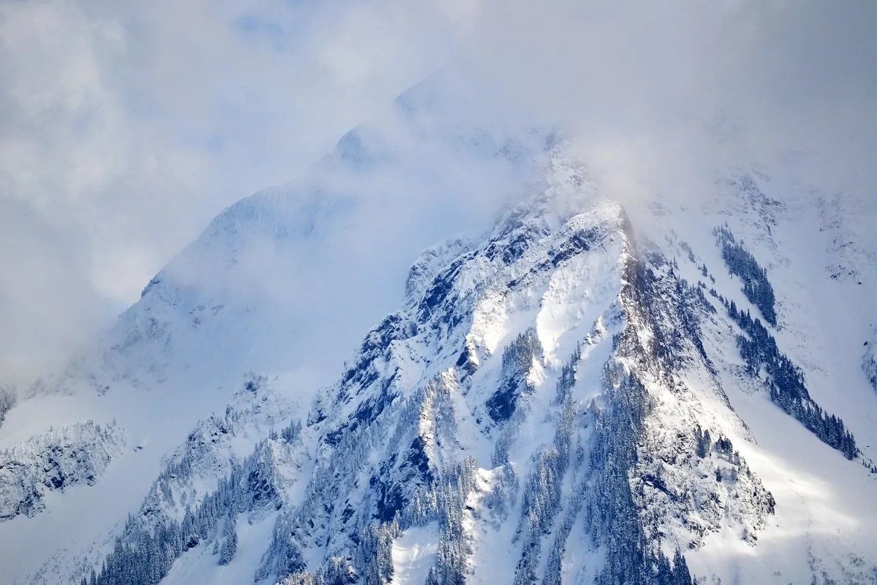 Breathtaking Snowy Peaks: Majestic Winter Alpine Landscape