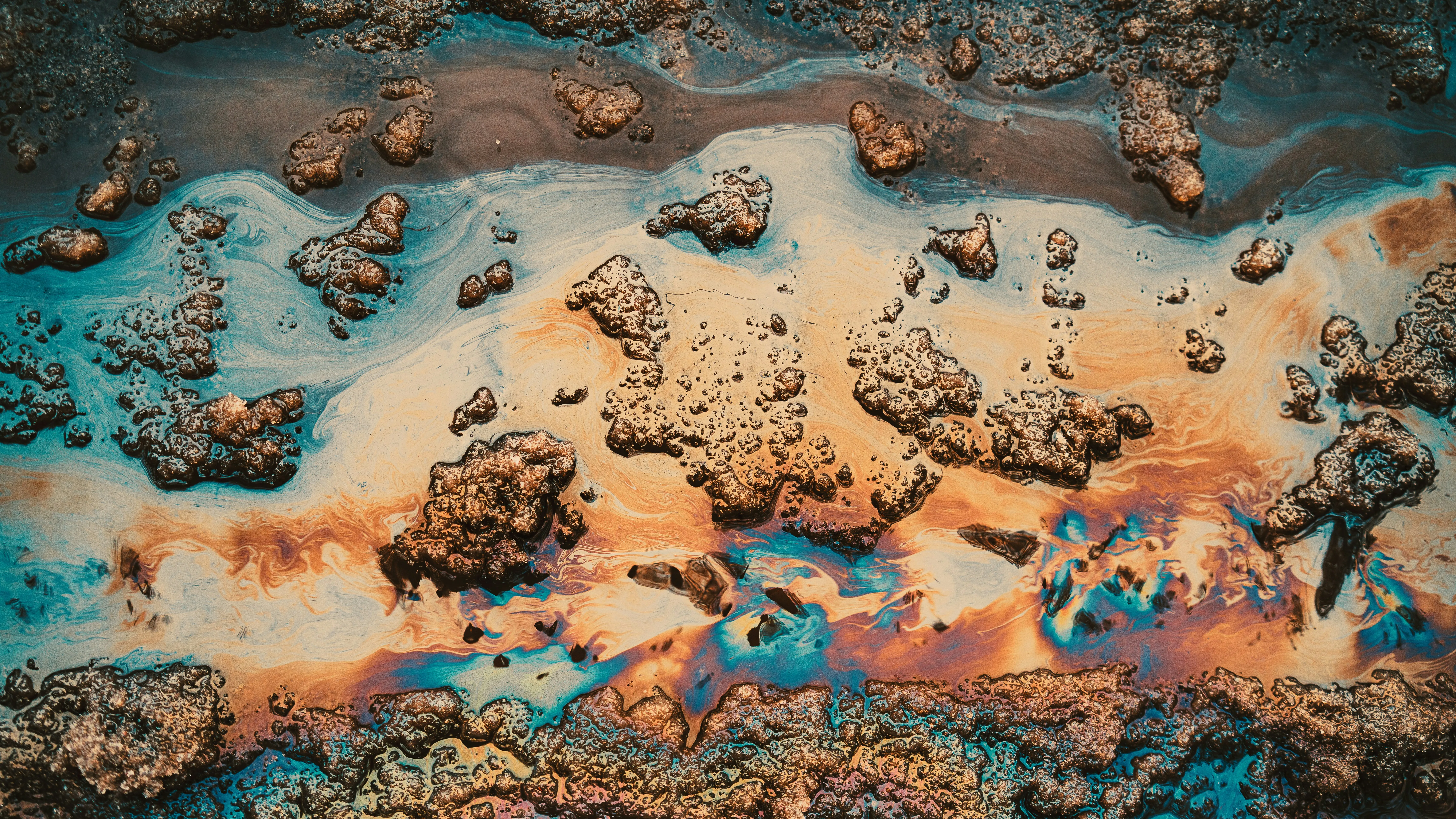 Hypnotic Iridescent Oil Slick on Water Surface