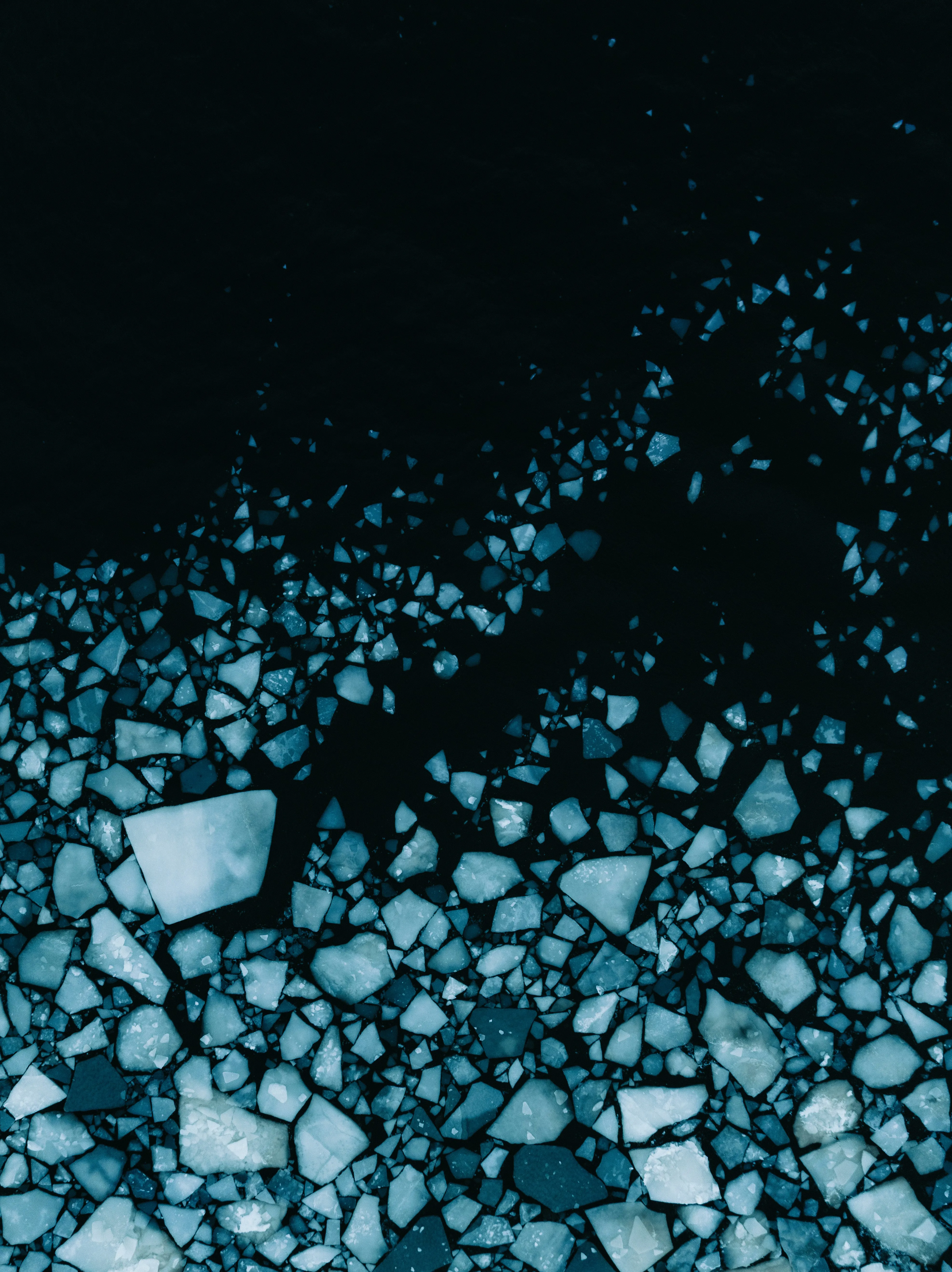 Stunning Ice Floes: A Dark Water Mosaic