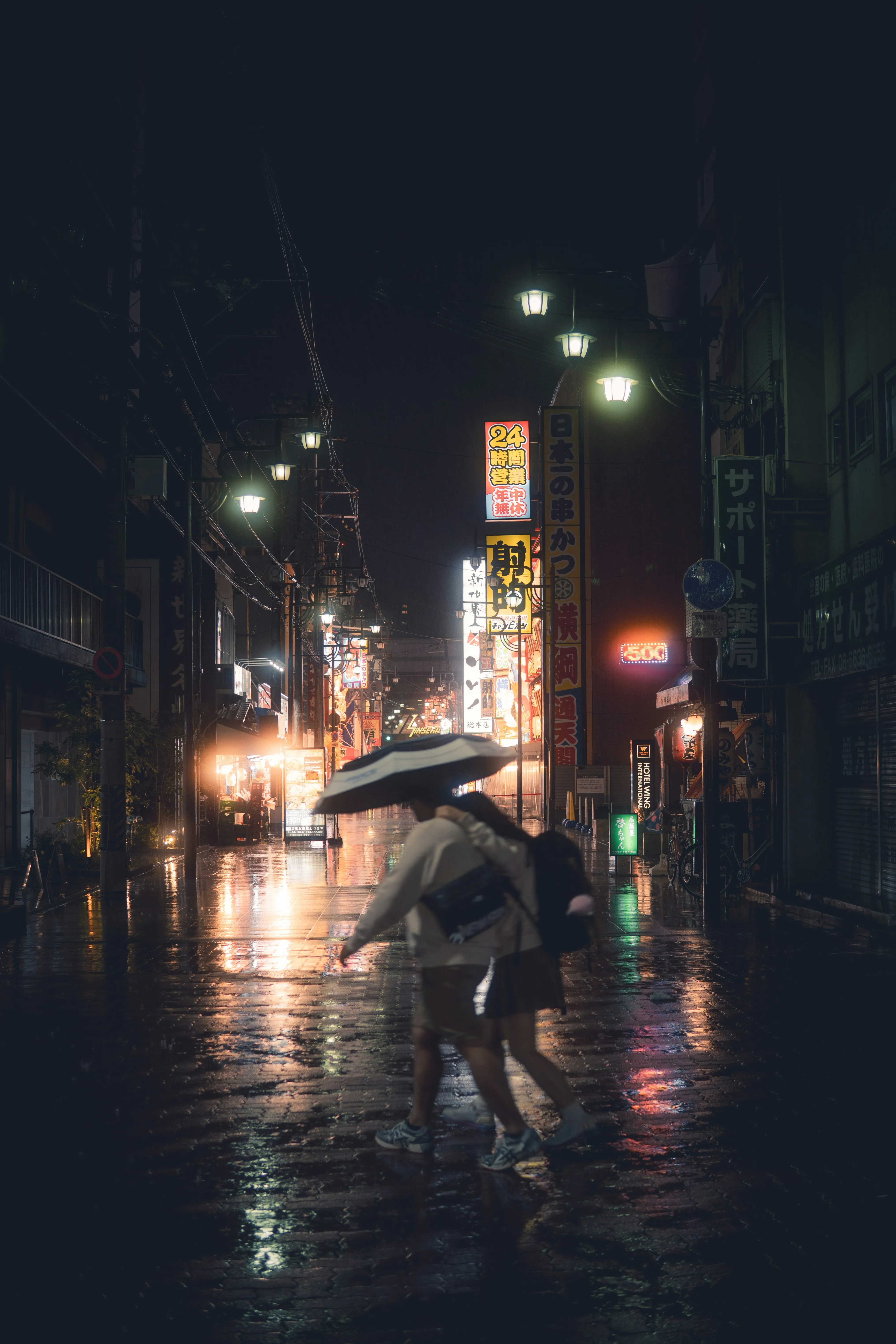 Enchanting Night: Couple Under Umbrella in Neon City Rain