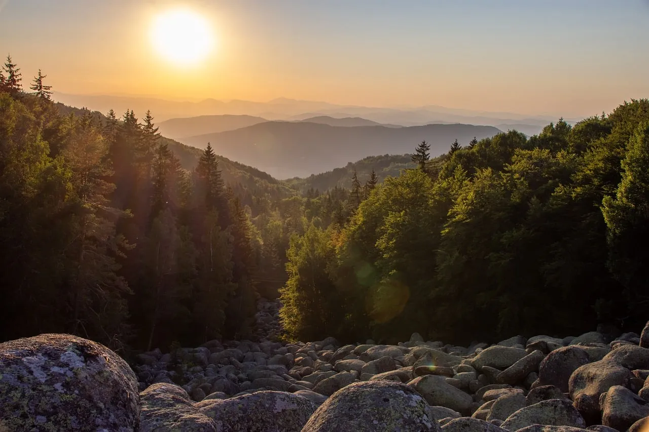 Breathtaking Sunset Over Serene Mountain Wilderness