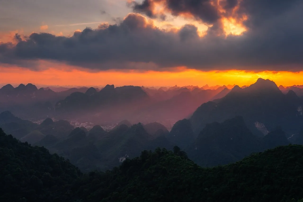 Dramatic Sunset Over Vietnam's Misty Mountains
