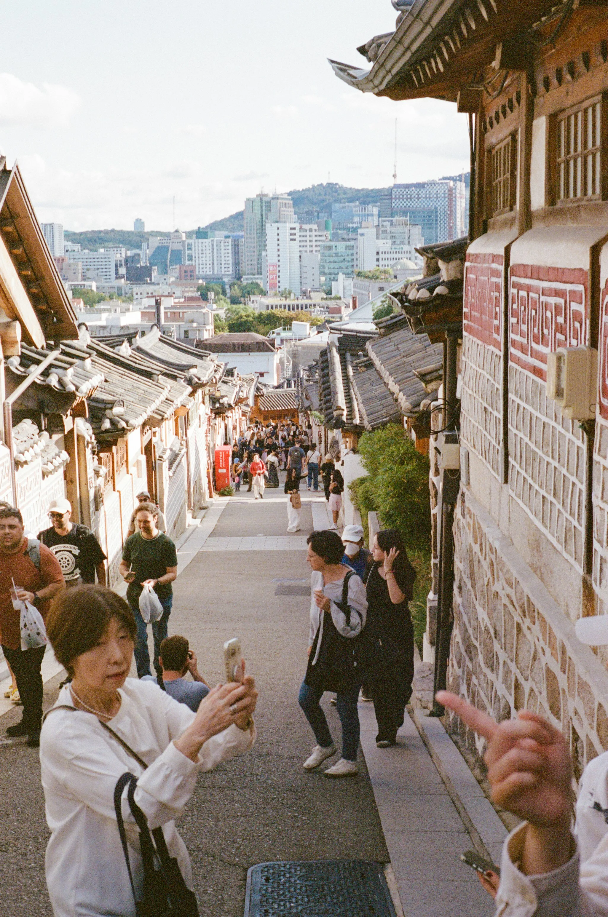 Vibrant Korean Alley: Traditional Charm Meets City Life