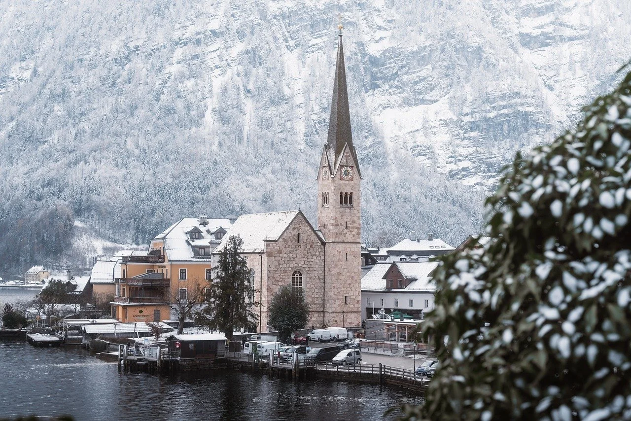 Breathtaking Alpine Village: Serene Winter Wonderland by the Lake