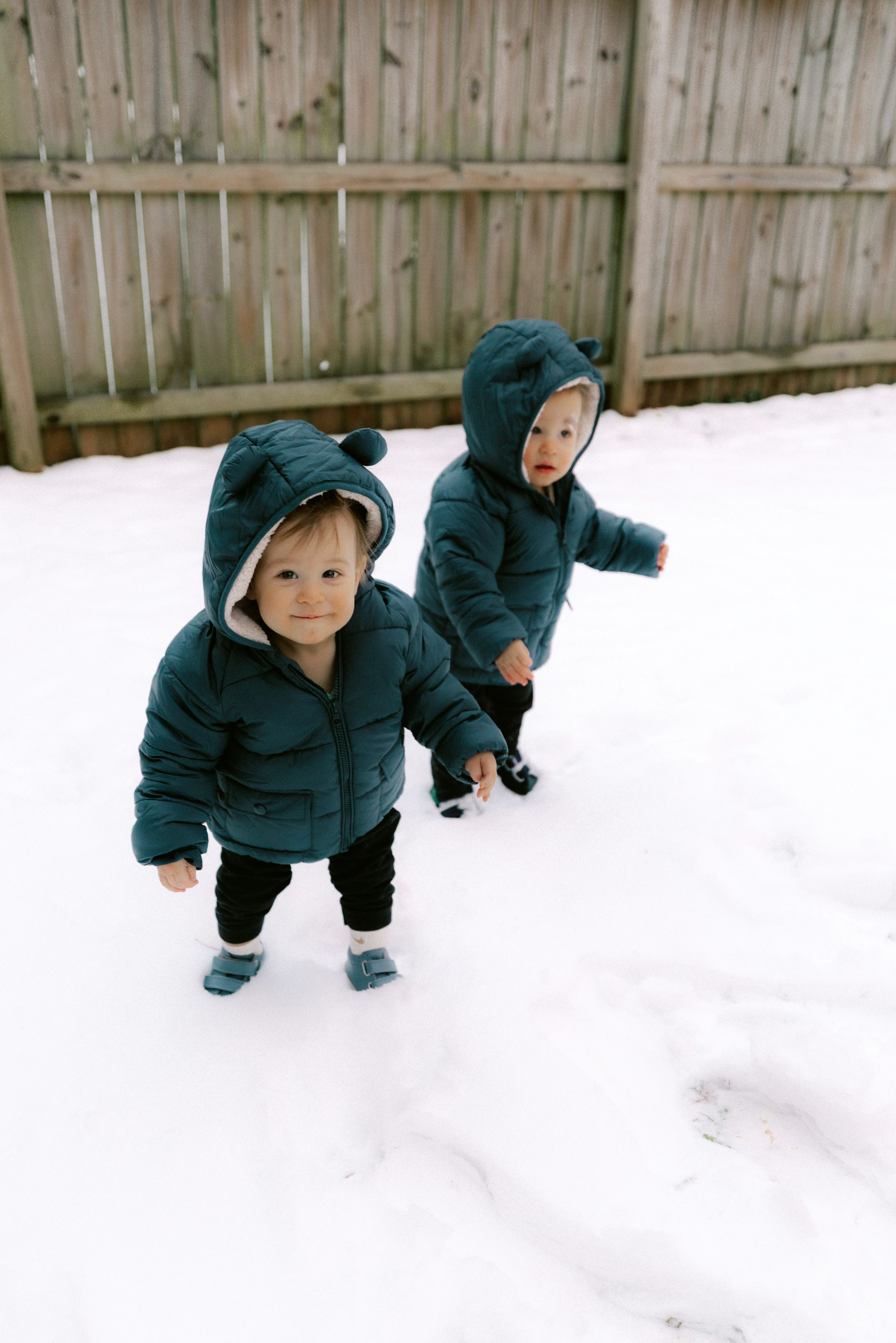 Adorable Toddlers Discovering Winter Wonderland Fun