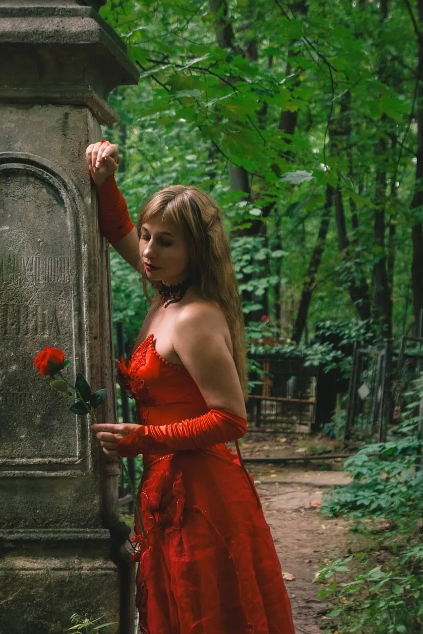 Enchanting Gothic Romance: Woman in Red in a Mystical Forest