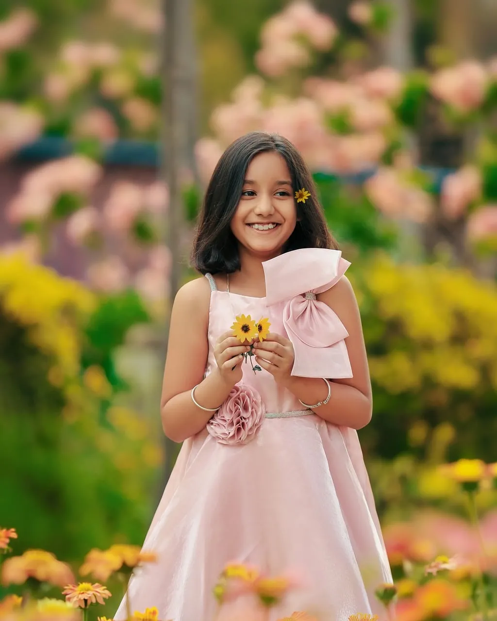 Joyful Child Amidst Blooming Flowers