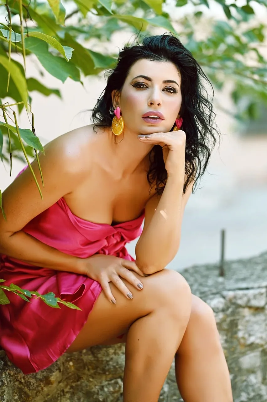 Stunning Woman in Pink: Elegance Amidst Nature's Embrace