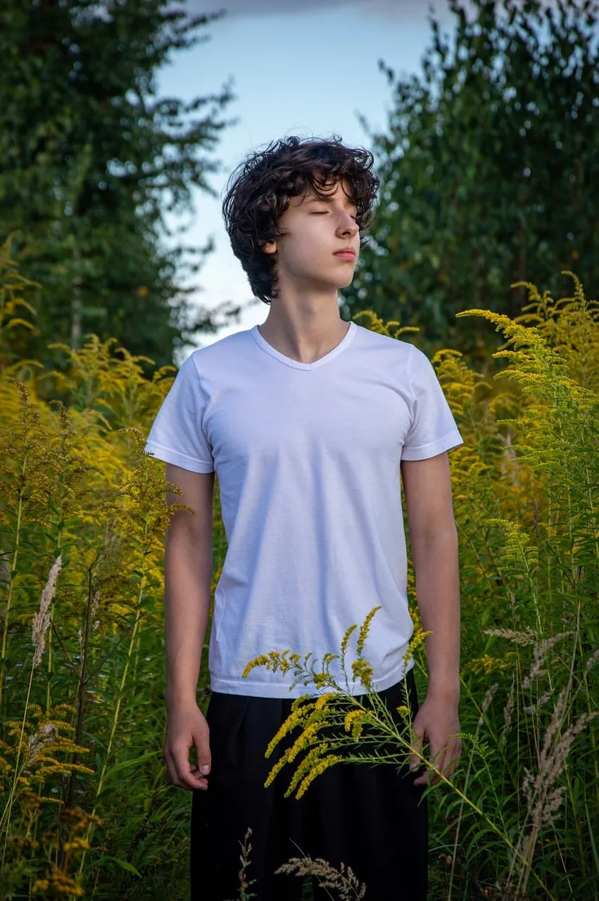 Serene Youthful Escape: Man in Nature's Embrace