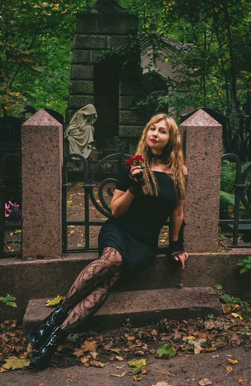 Enchanting Gothic Elegance Amidst Autumnal Graveyard Serenity