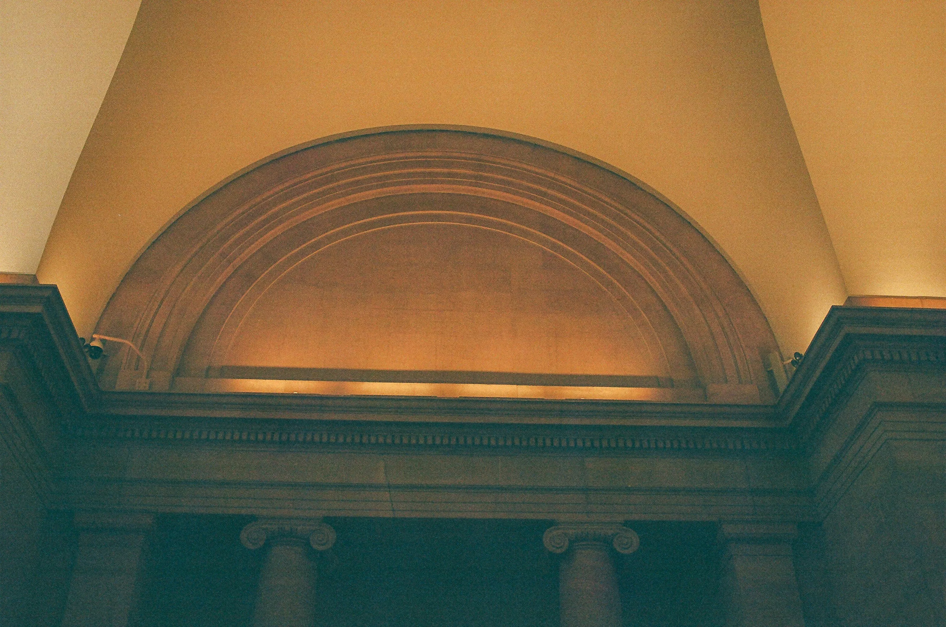 Timeless Archway: Classical Columns & Elegant Curves