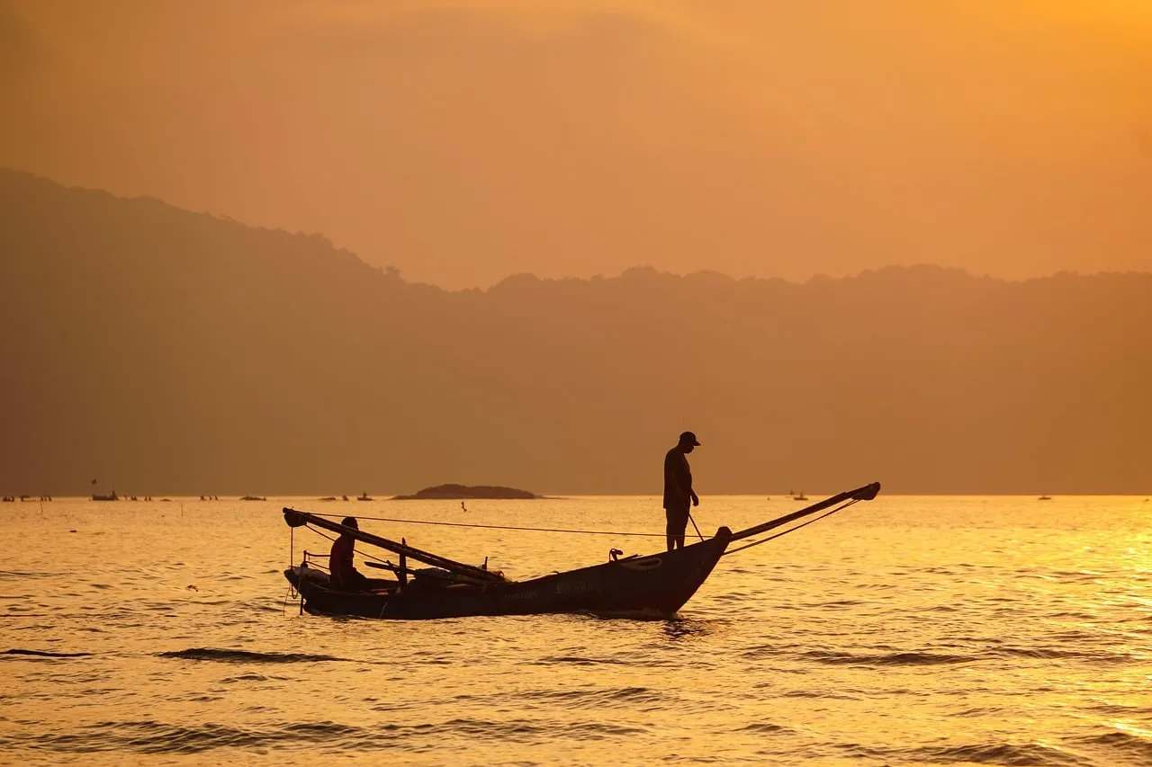 Golden Hour Serenity: Fishermen at Dawn