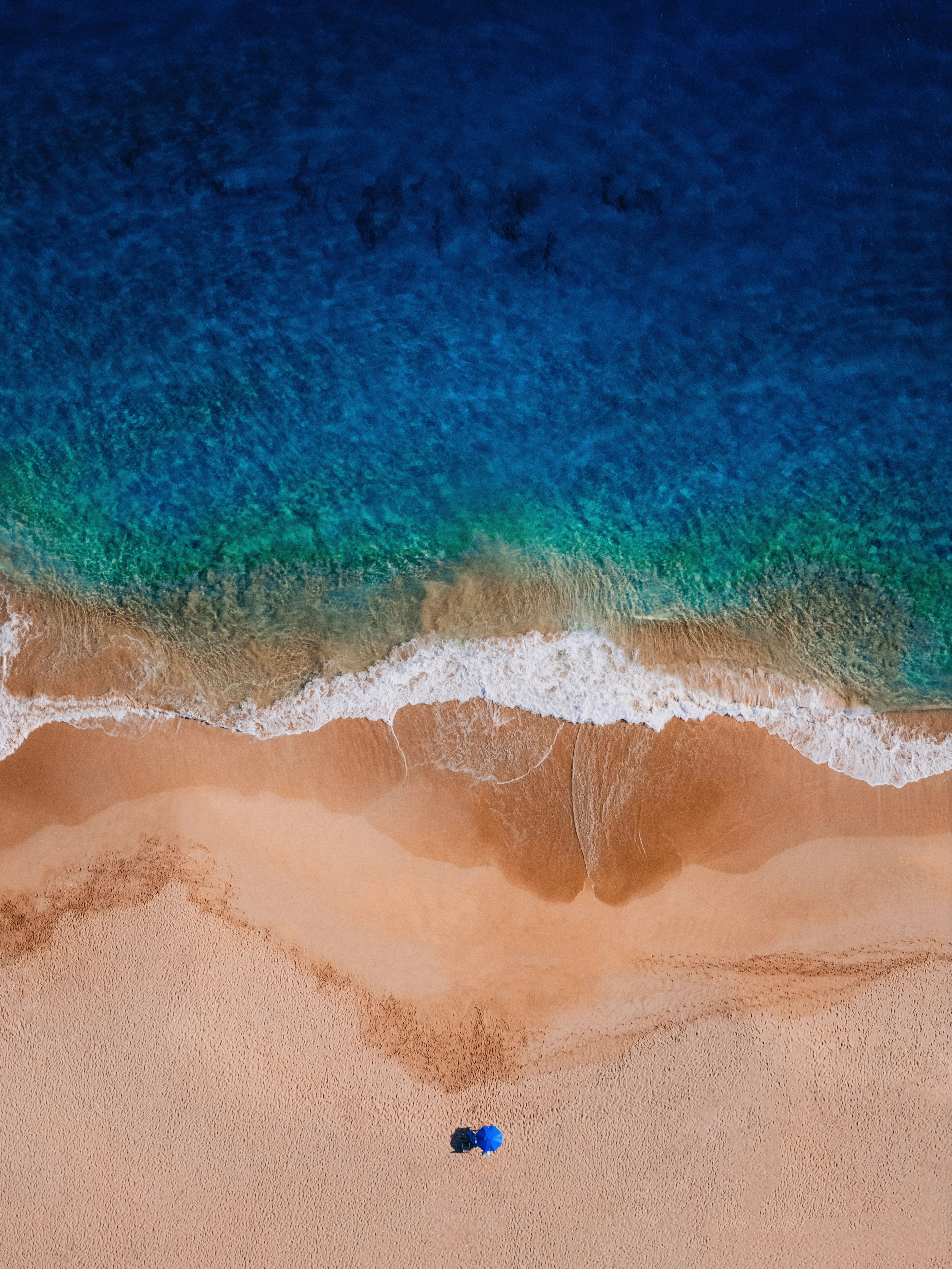 Stunning Aerial View: Serene Beach Retreat with Turquoise Waters