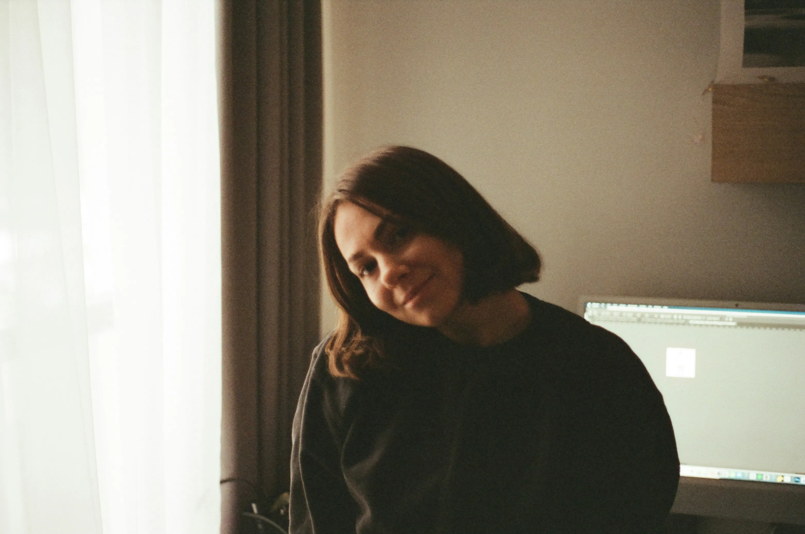 Radiant Charm: Gentle Smile of a Young Woman