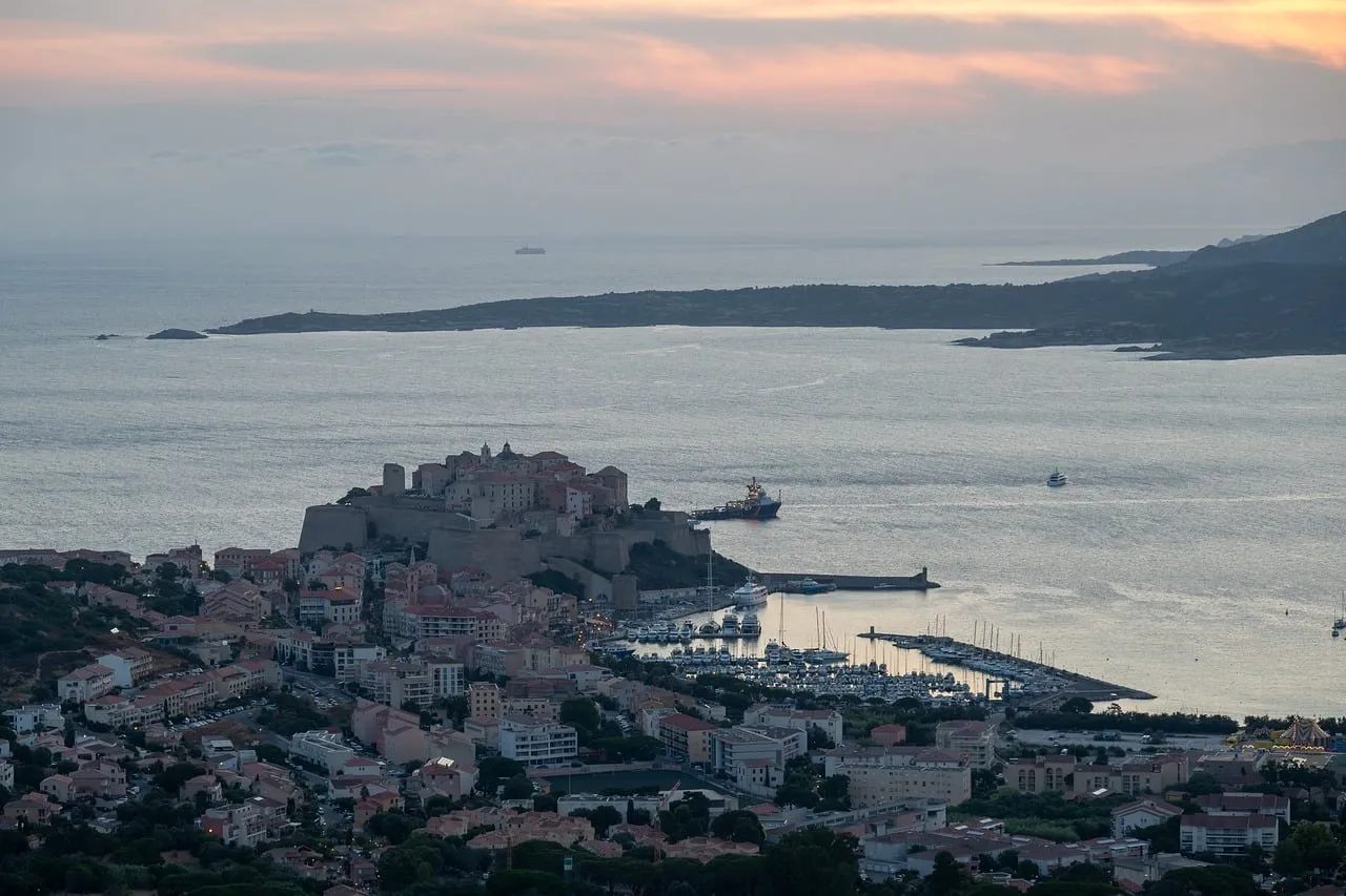 Breathtaking Calvi Dawn: Harbor City Awakens Under Pastel Skies