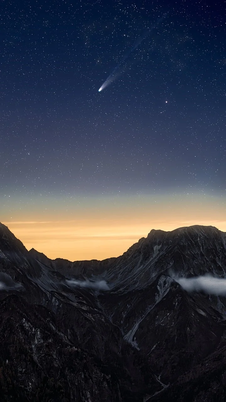 Celestial Spectacle: Comet Lemmon Graces Japan's Alps at Sunset
