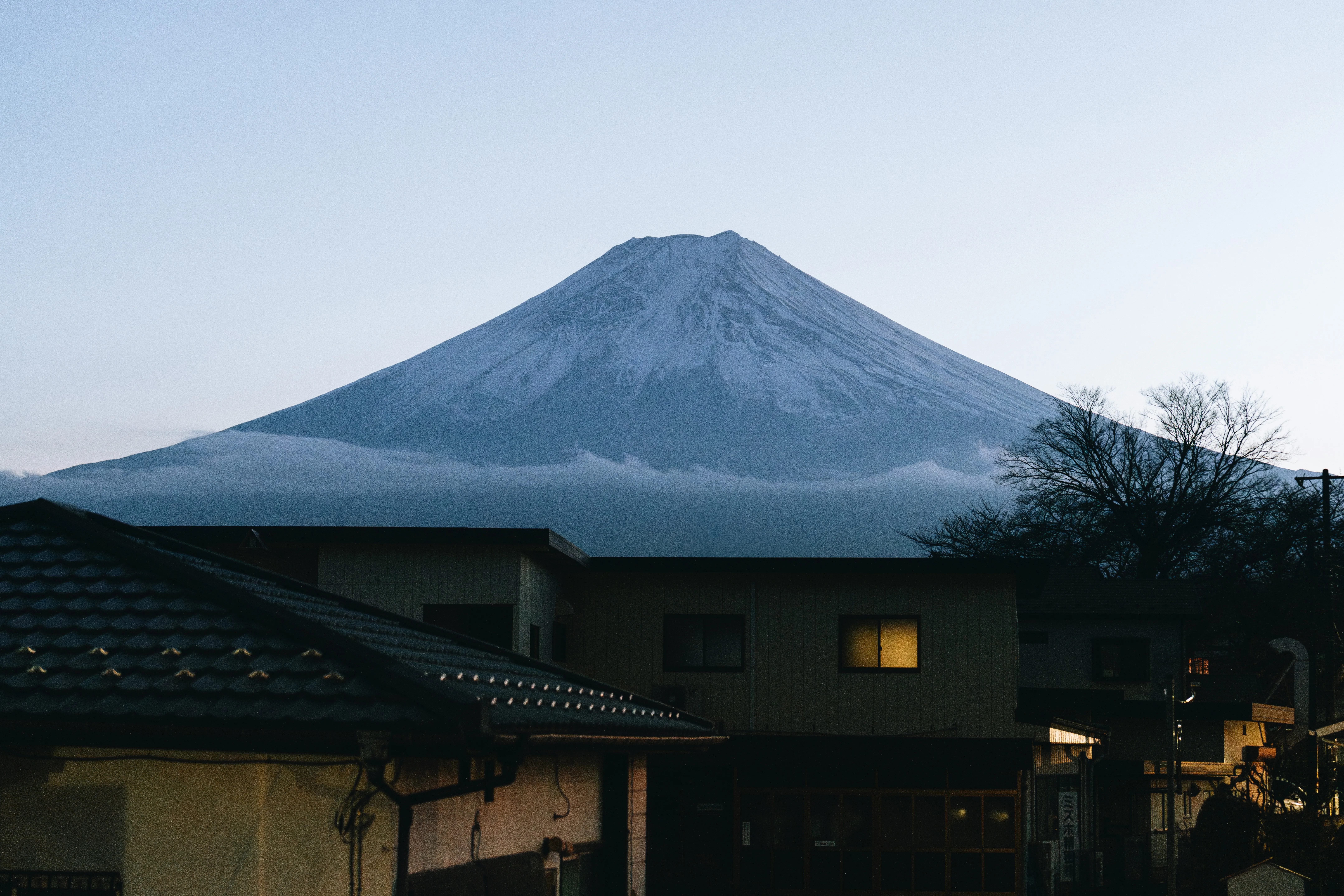 Majestic Fuji: Snow-Capped Peak Overlooks Tranquil Town