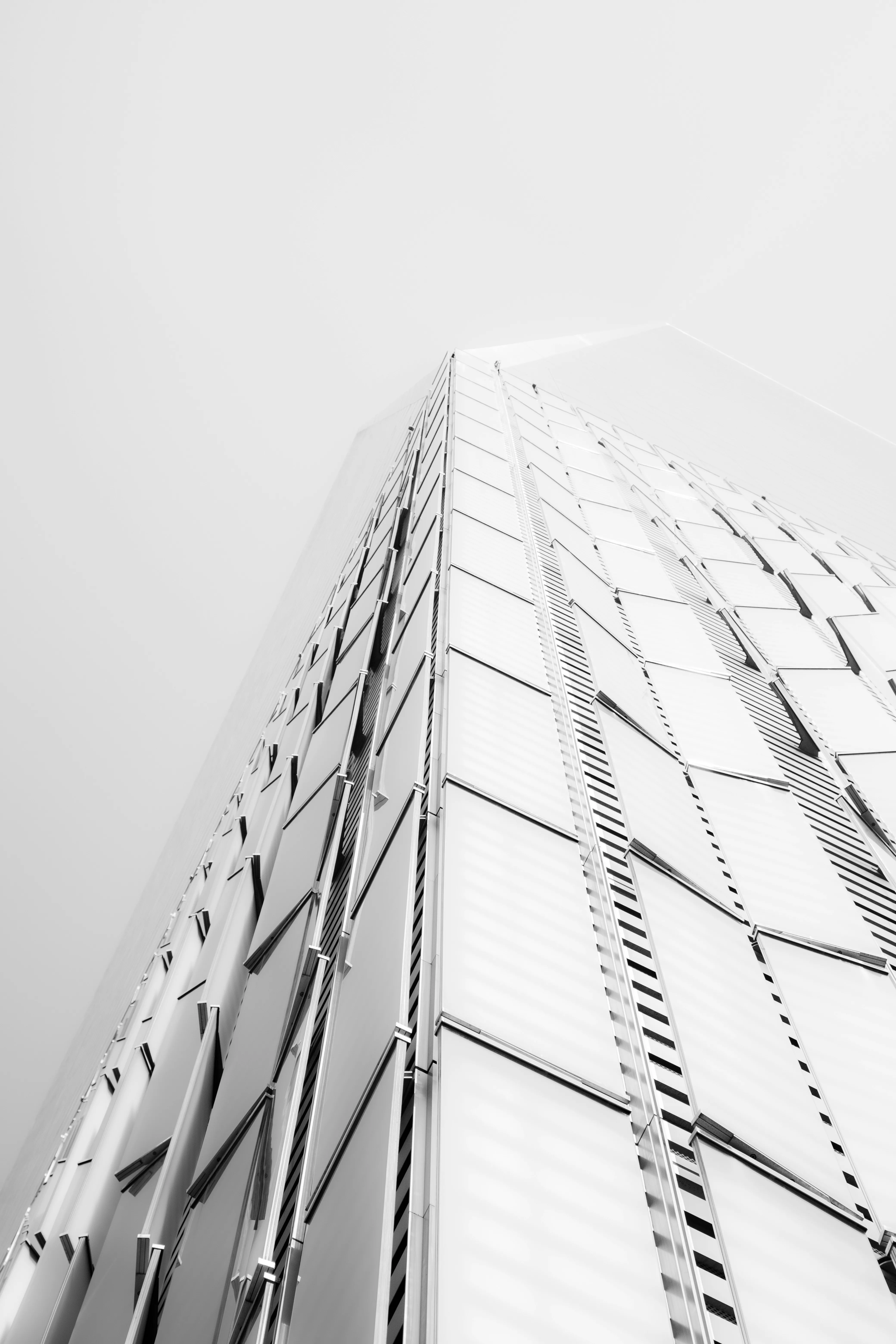 Striking Modern Skyscraper Fades into Misty Sky