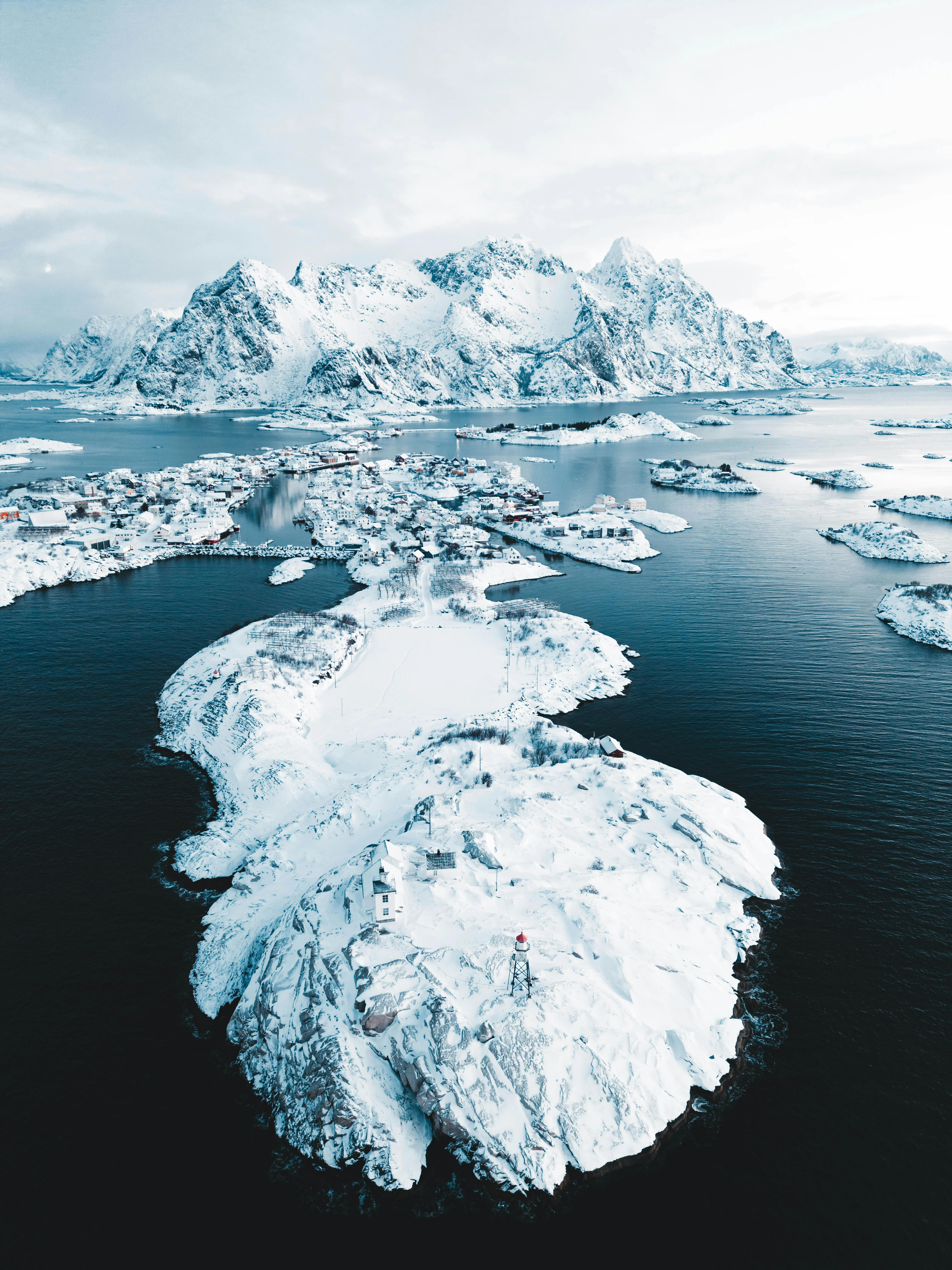 Breathtaking Arctic Splendor: Snow-Covered Islands & Mountains