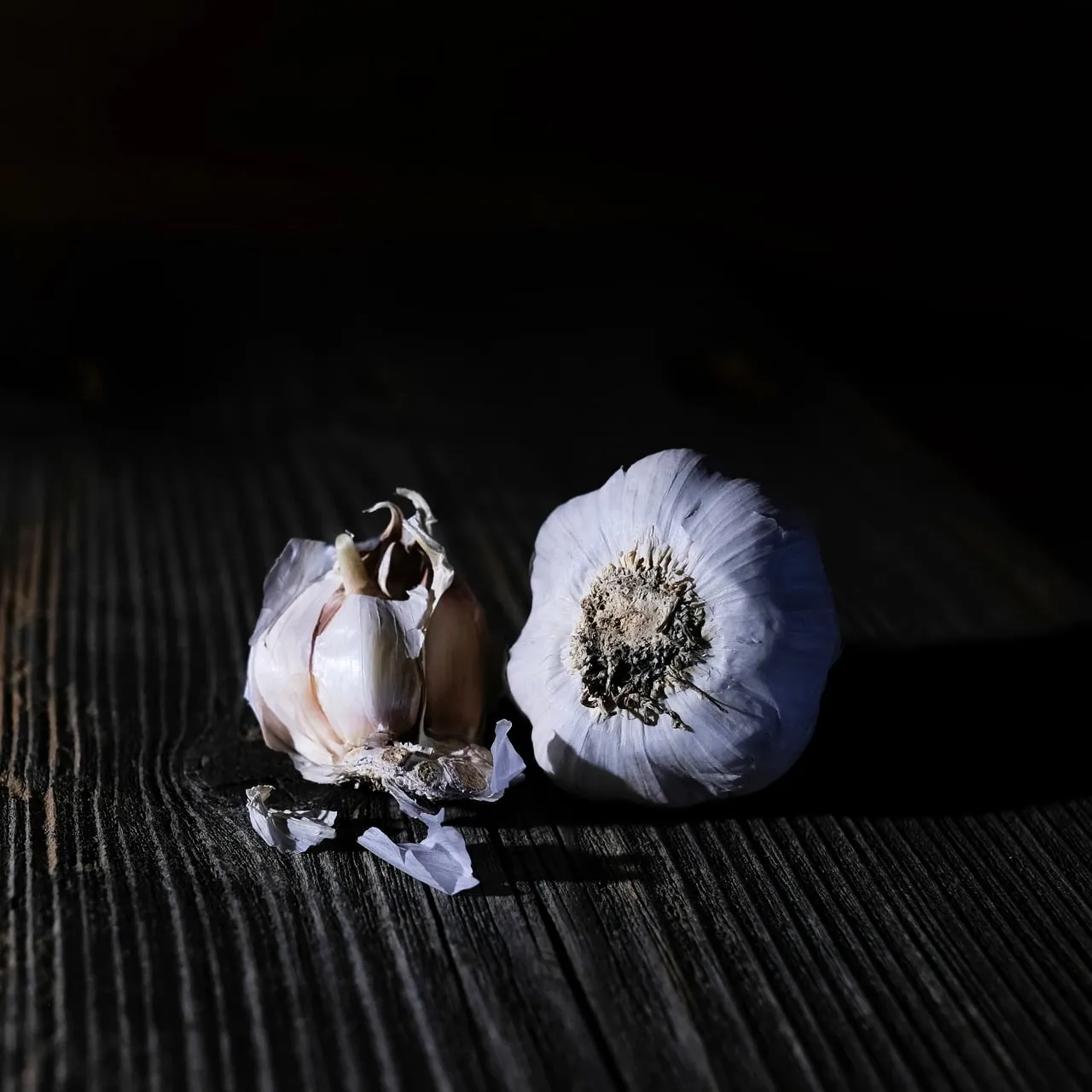 Rustic Garlic: Organic Spice on Dark Wood