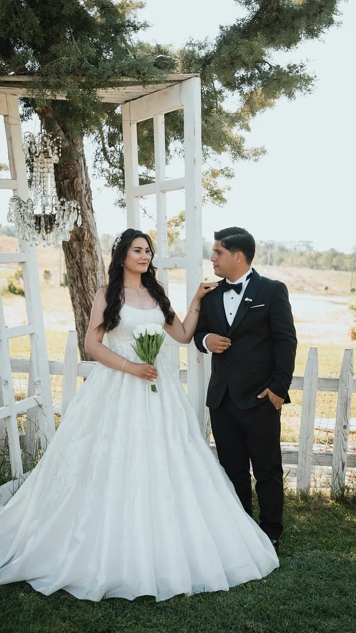 Enchanting Woodland Wedding: Bride and Groom's Romantic Embrace