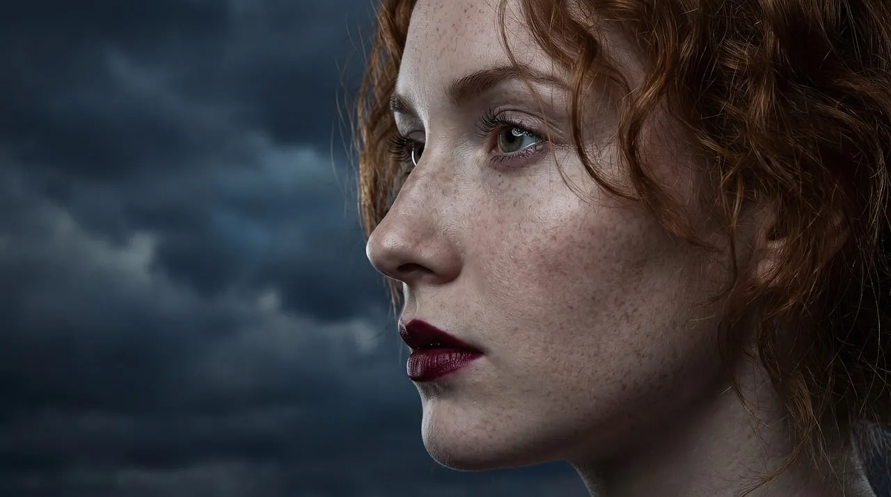Fiery Spirit: Redhead Gazing into the Storm