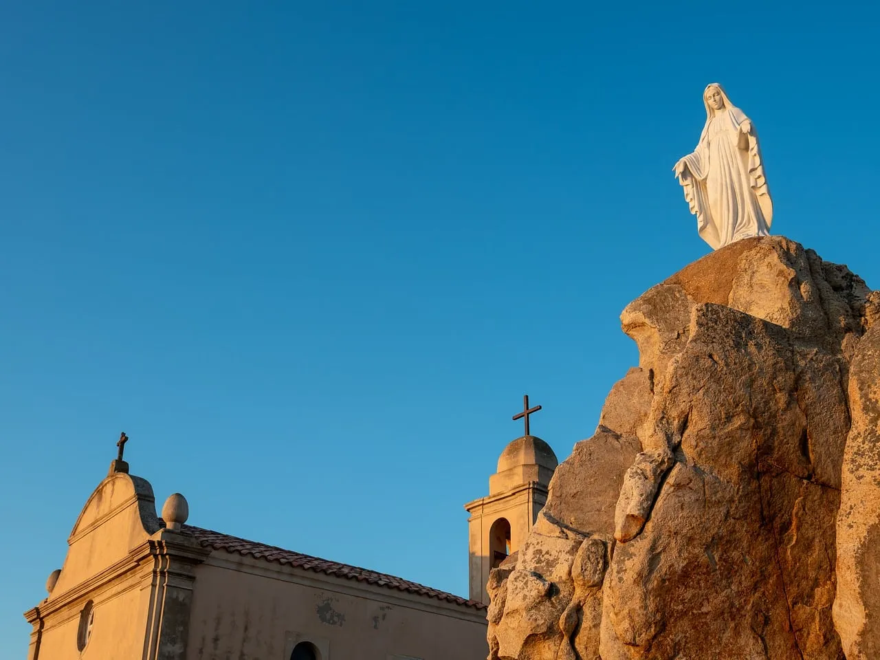 Serene Marian Shrine: Corsican Dawn's Gentle Embrace
