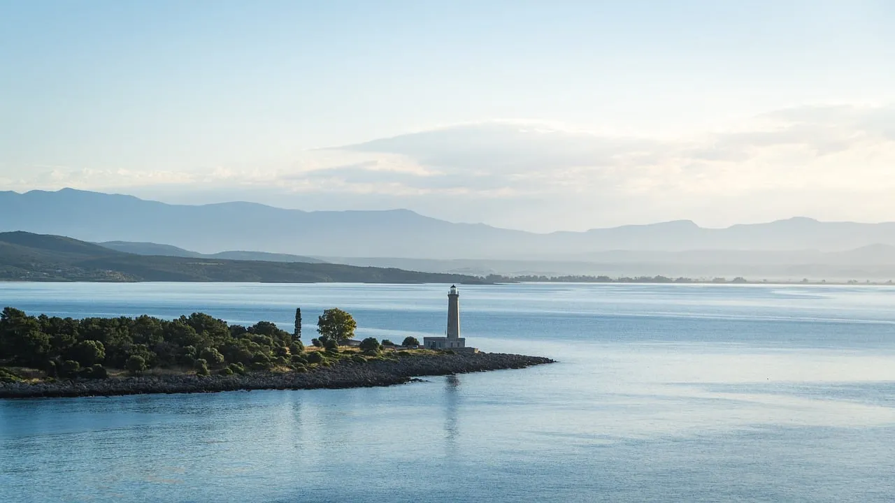 Serene Coastal Lighthouse: Tranquil Dawn Seascape