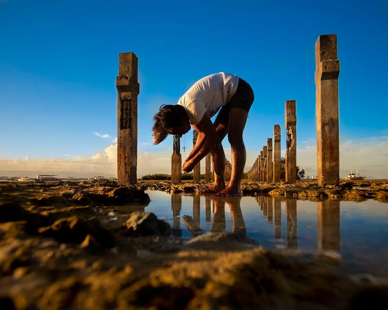 Stunning Sunset Solitude: Reflecting by Ancient Pillars