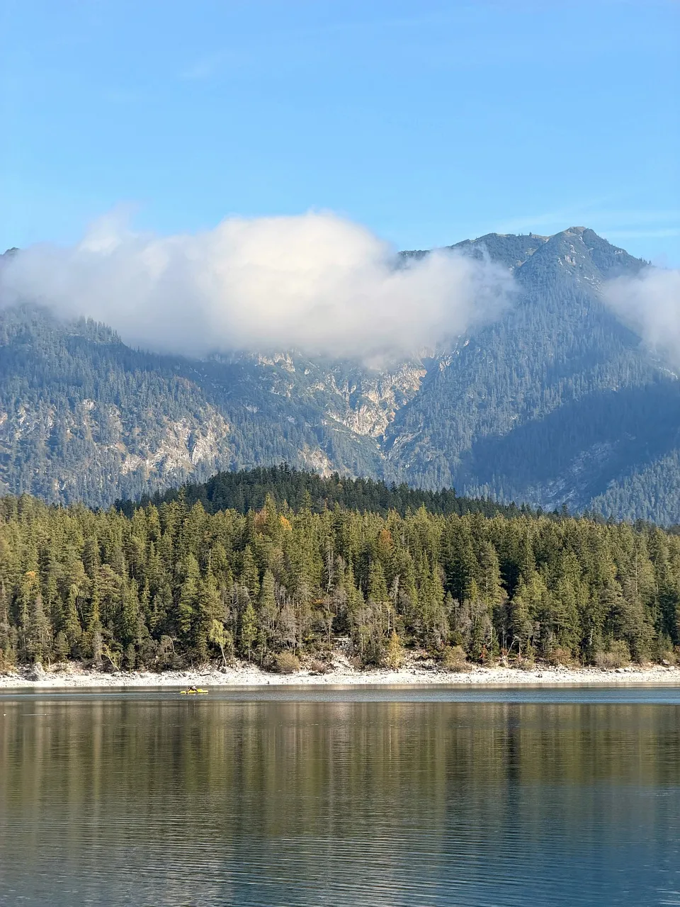 Serene Mountain Lake Reflecting Autumn's Majesty