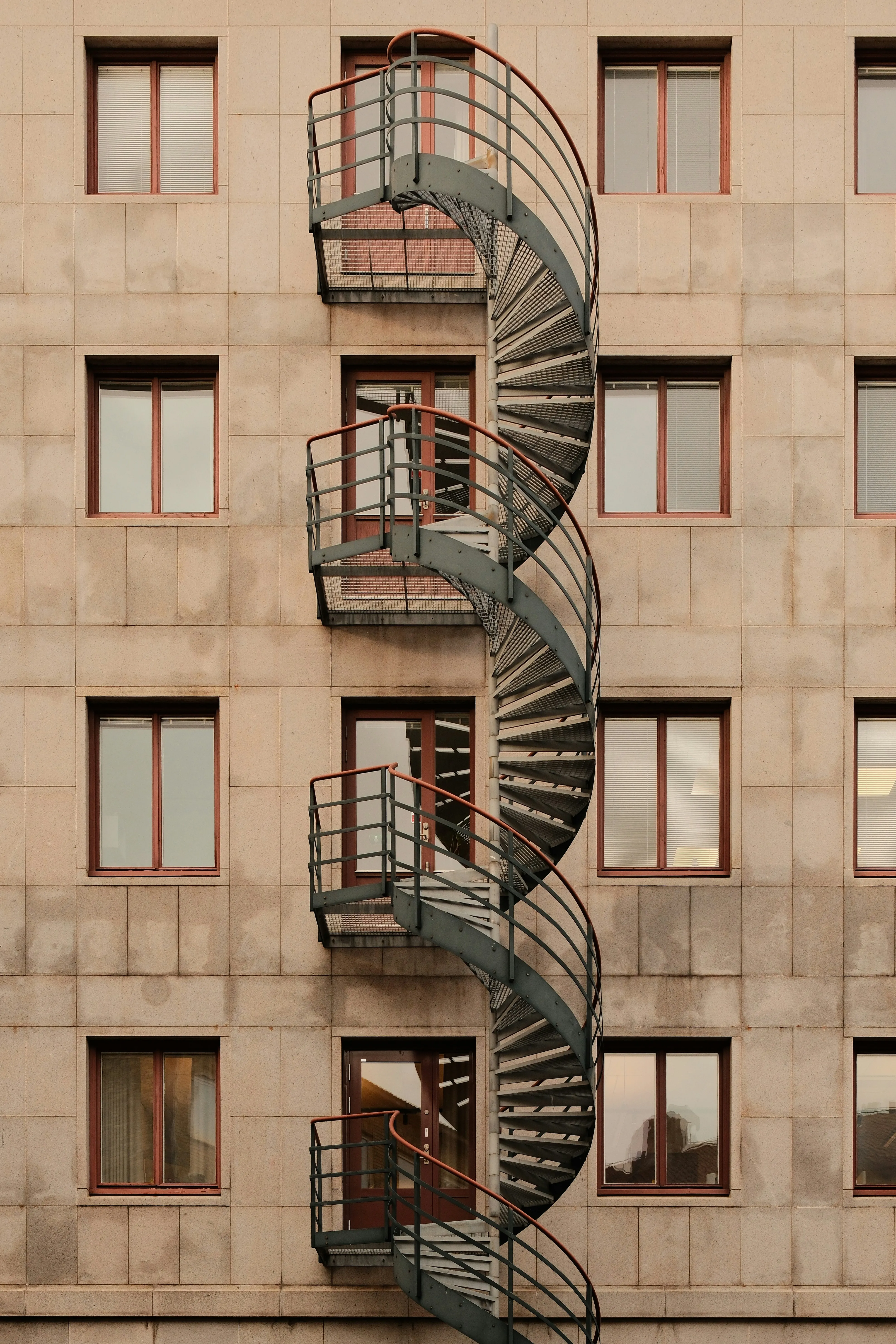 Striking Urban Twist: The Spiral Staircase on a Modern Building
