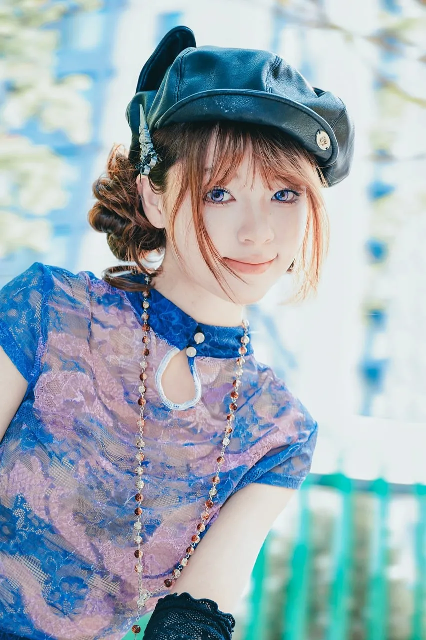 Charming Spring Portrait: Elegant Woman in Blue Lace