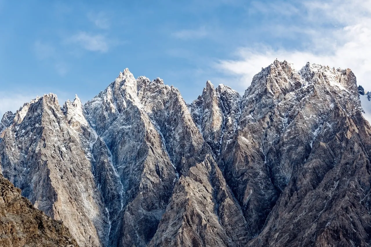 Majestic Passu Cones: Karakoram's Snow-Capped Peaks