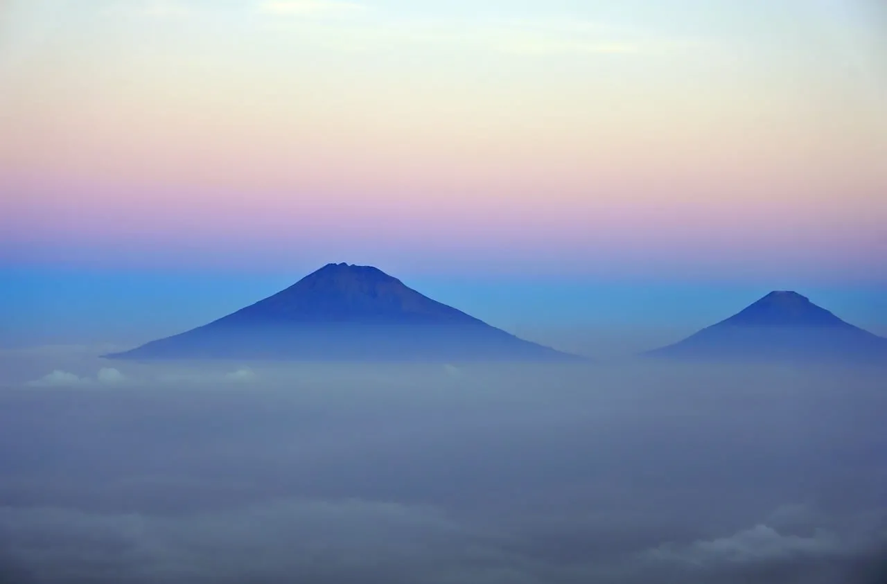 Breathtaking Mountain Sunrise Above the Clouds Panorama