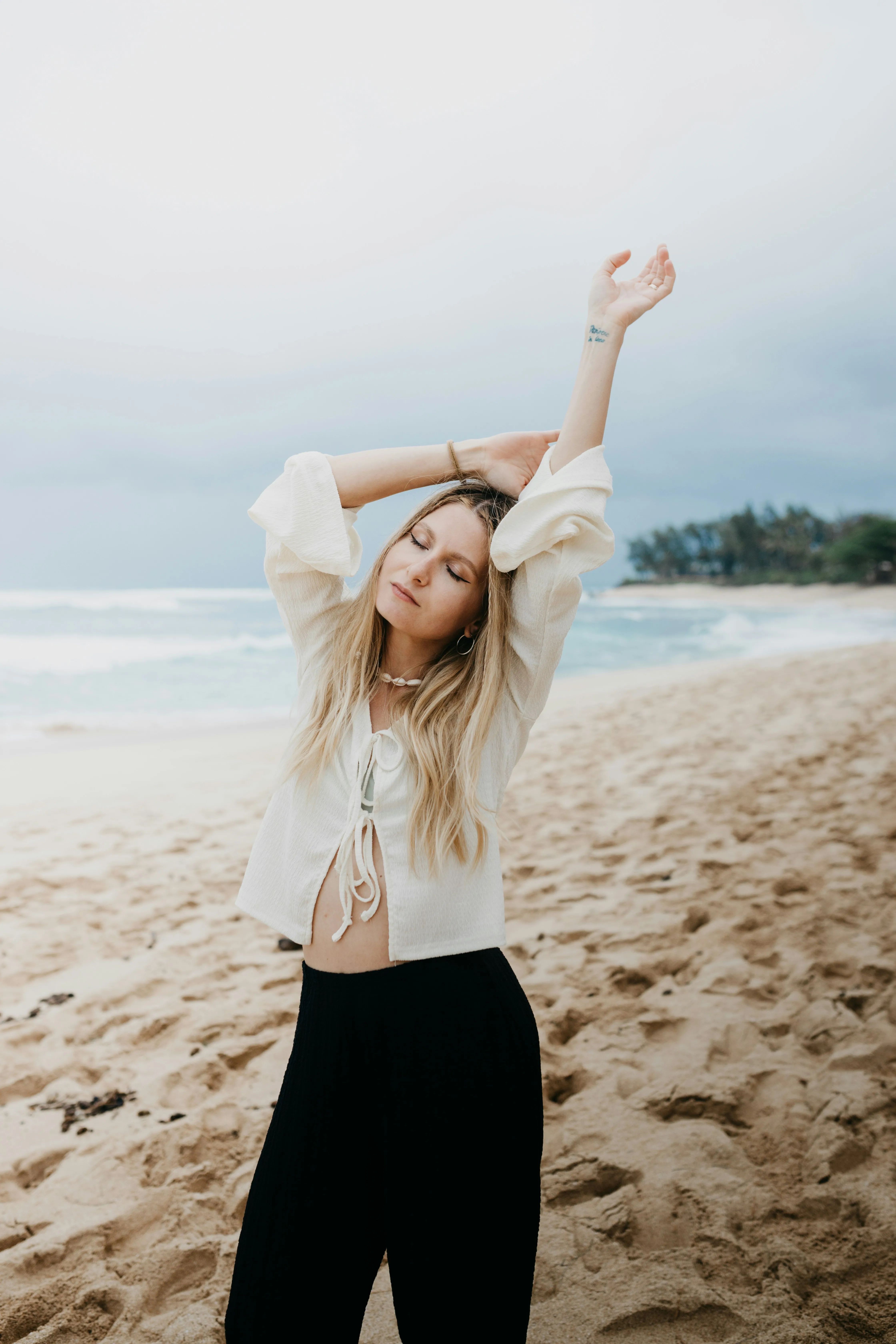 Serene Beach Bliss: Young Woman Embracing Nature's Peace