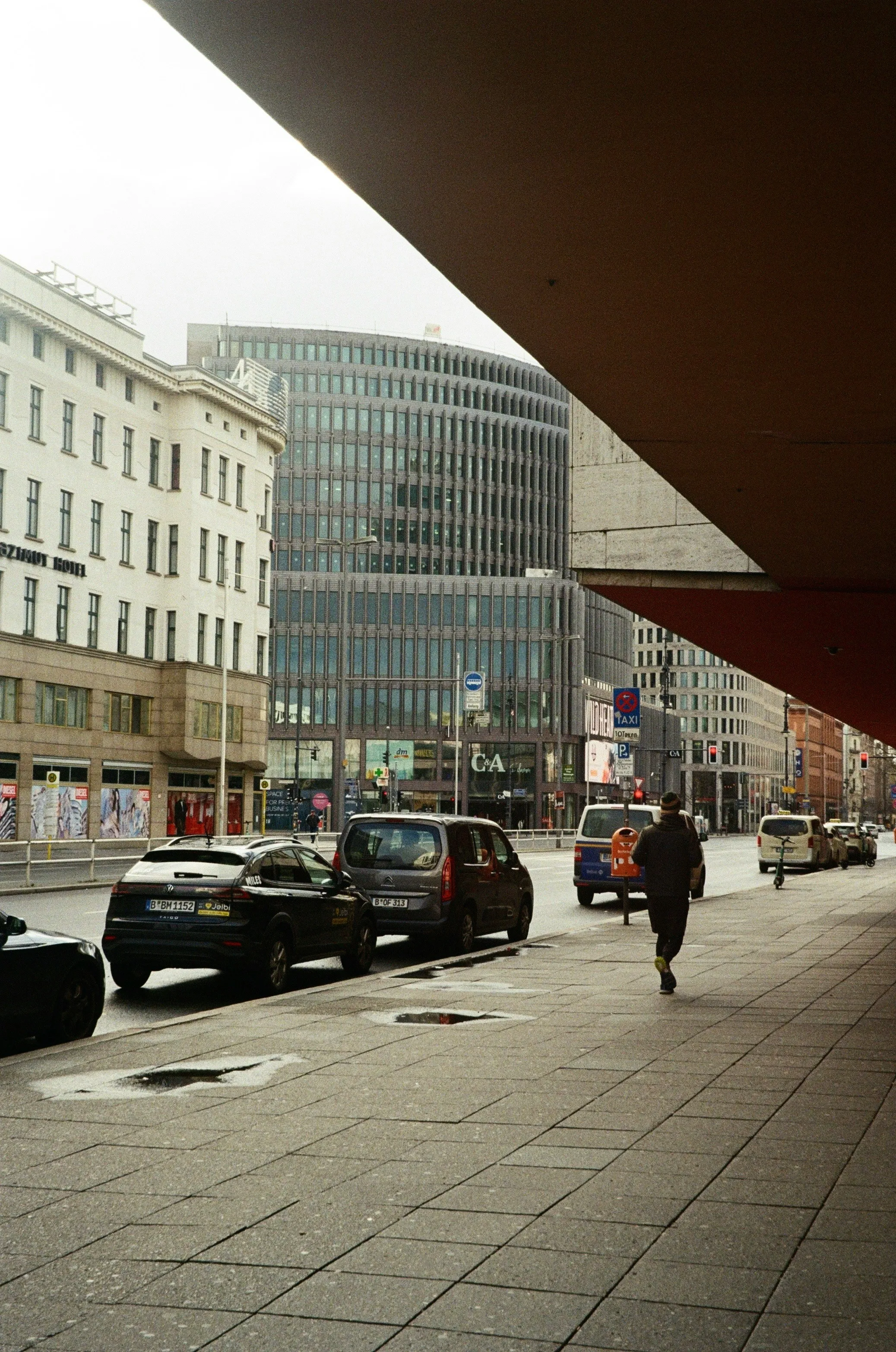 Urban Serenity: City Street Under Overcast Skies