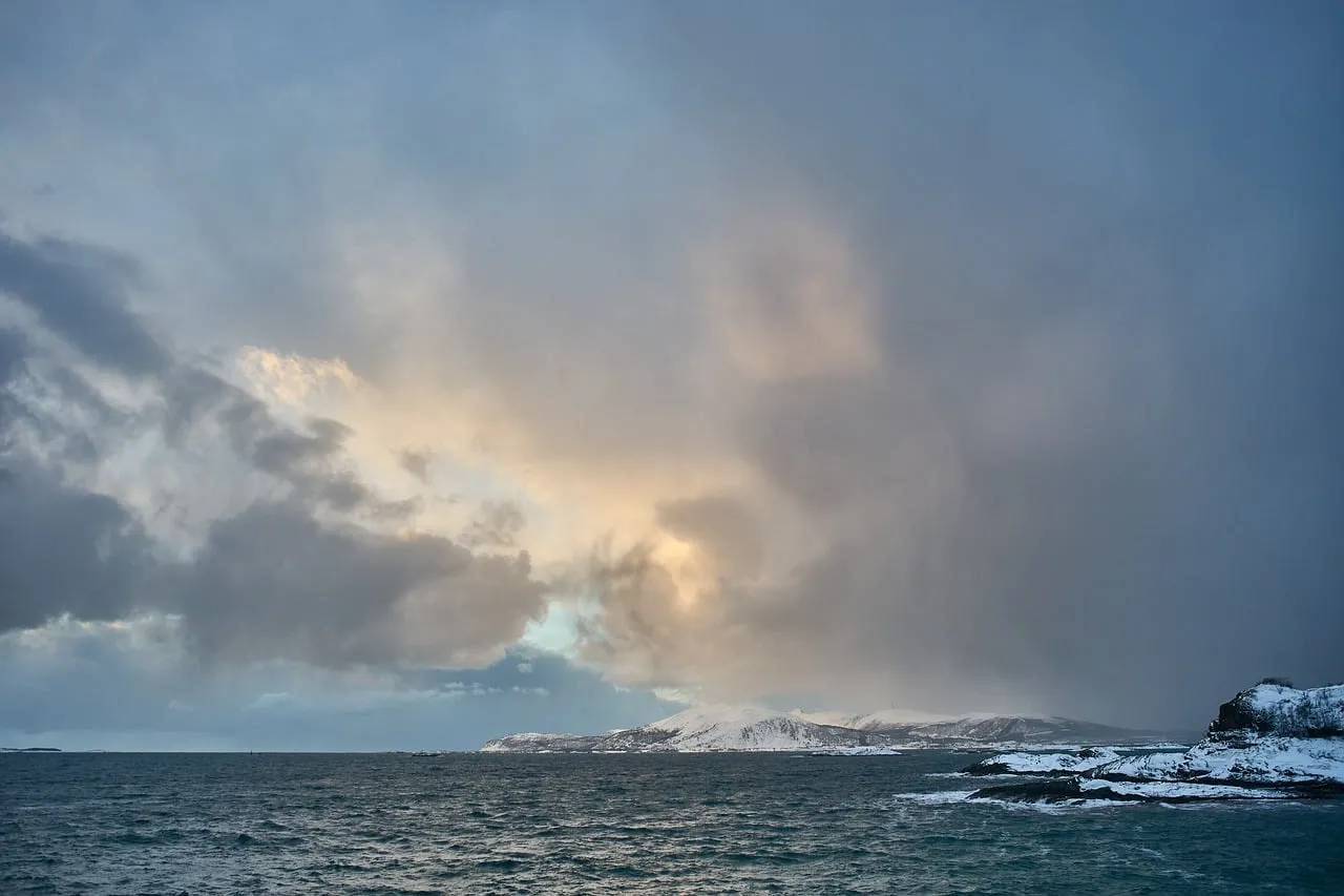 Dramatic Winter Sunrise over the Norwegian Fjord