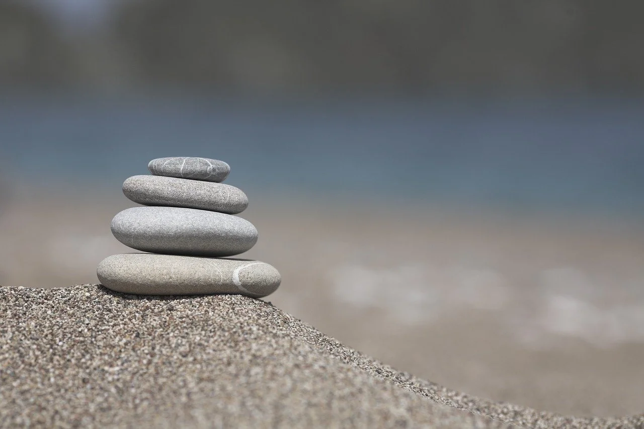 Zen Balance: Serene Stone Stack on Tranquil Beach
