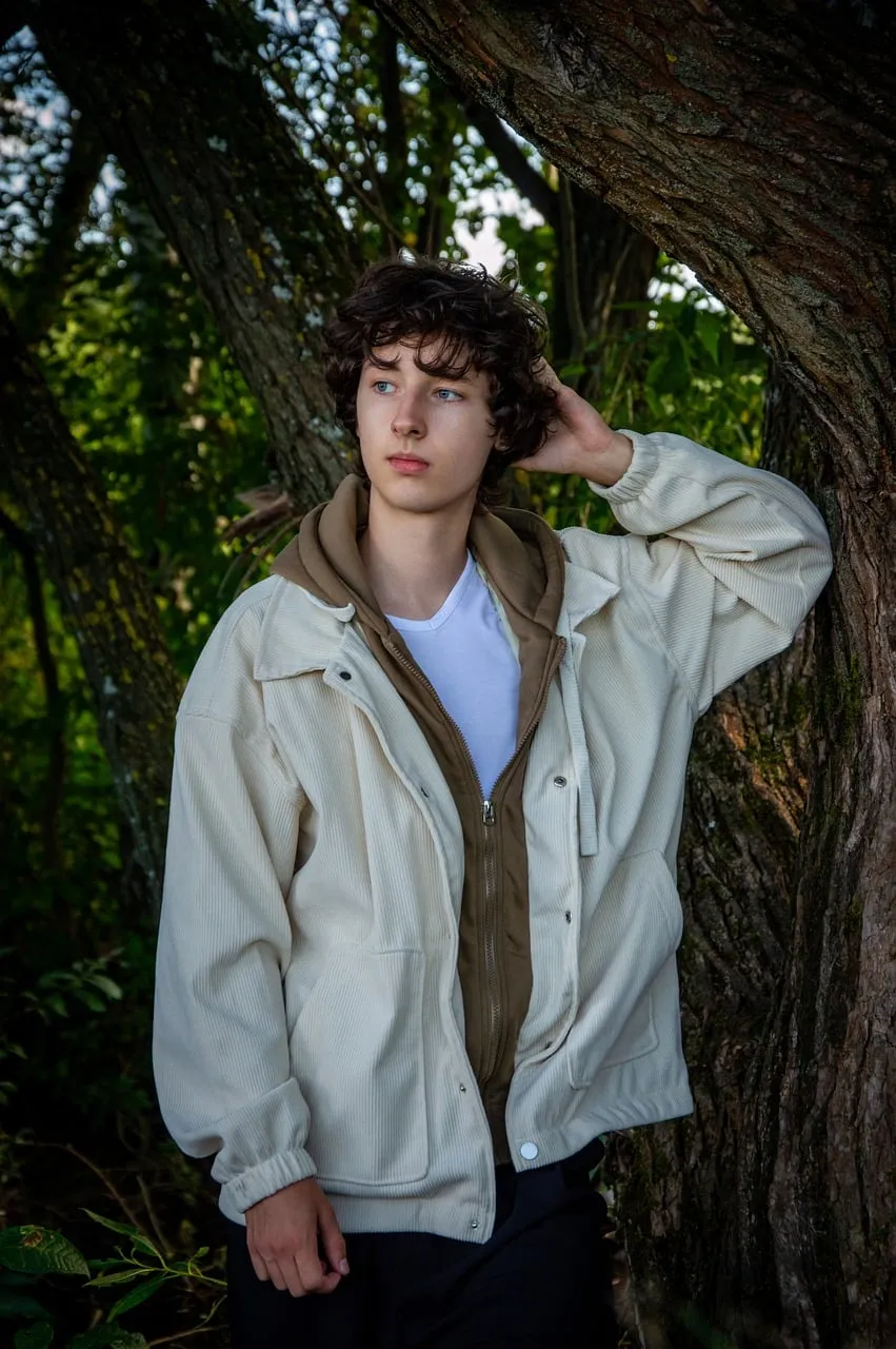 Serene Youthful Contemplation Amidst Nature's Embrace