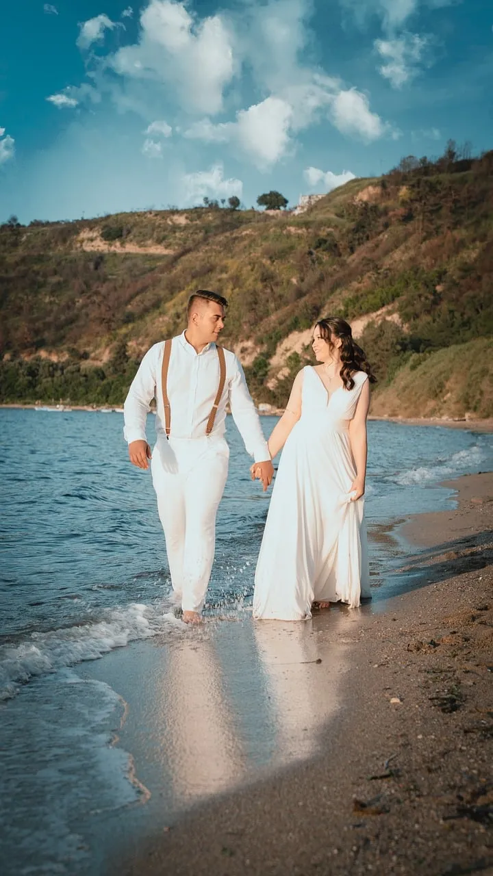 Romantic Beach Wedding: A Couple's Serene Stroll