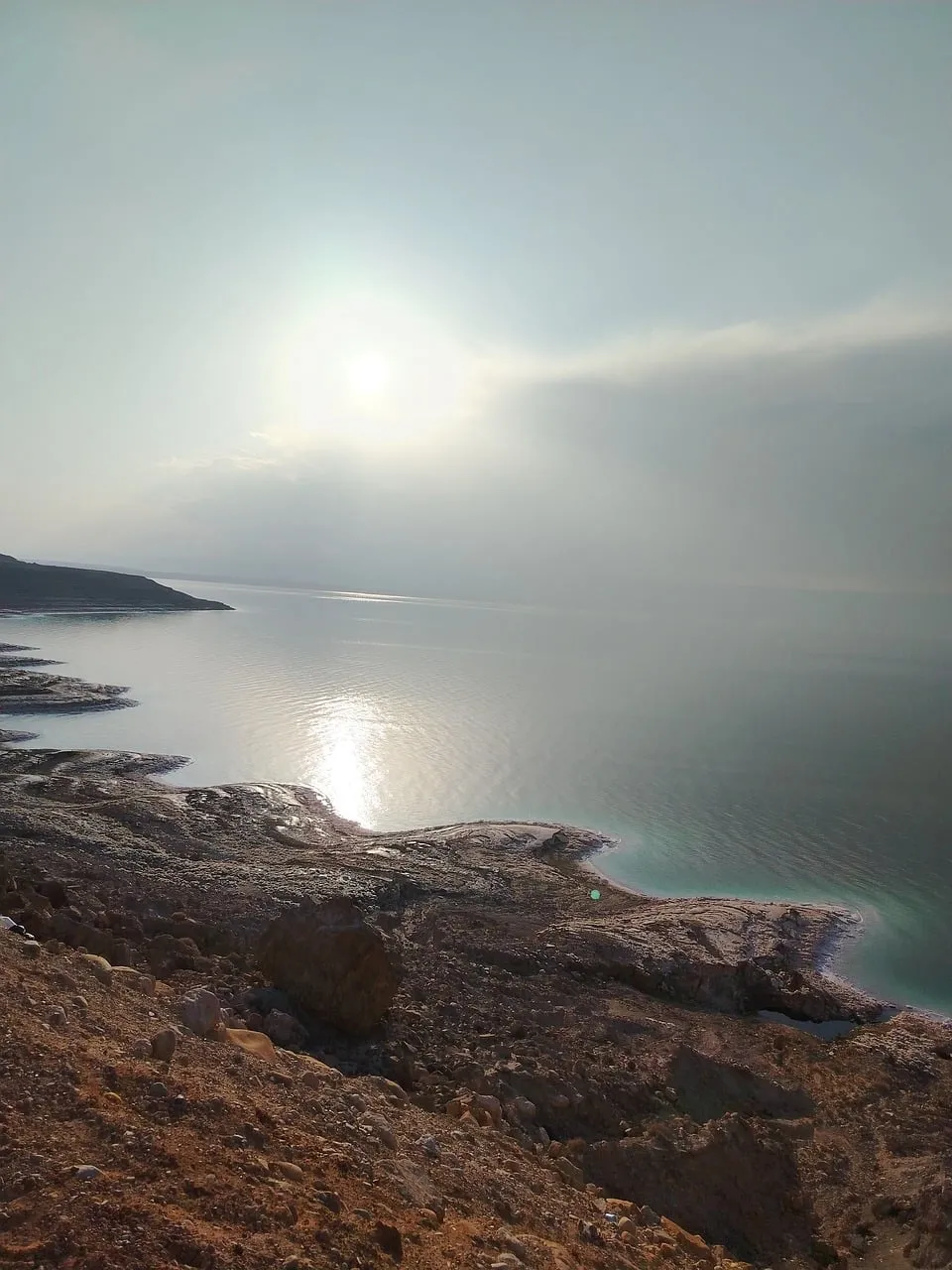Breathtaking Coastal Sunrise: A Serene Morning on the Rocky Shore