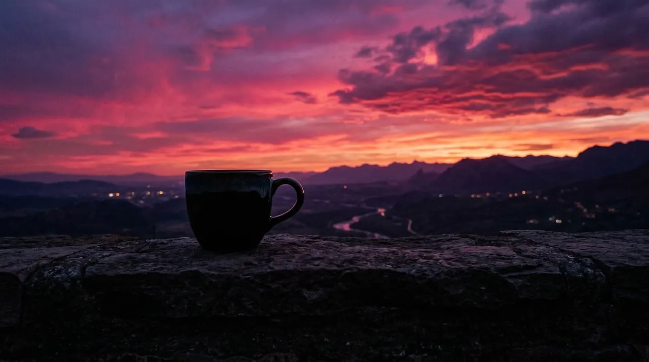Breathtaking Sunset View with Coffee Mug Silhouette
