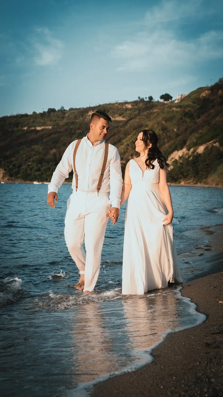 Idyllic Beach Romance: Happy Wedding Couple by the Sea
