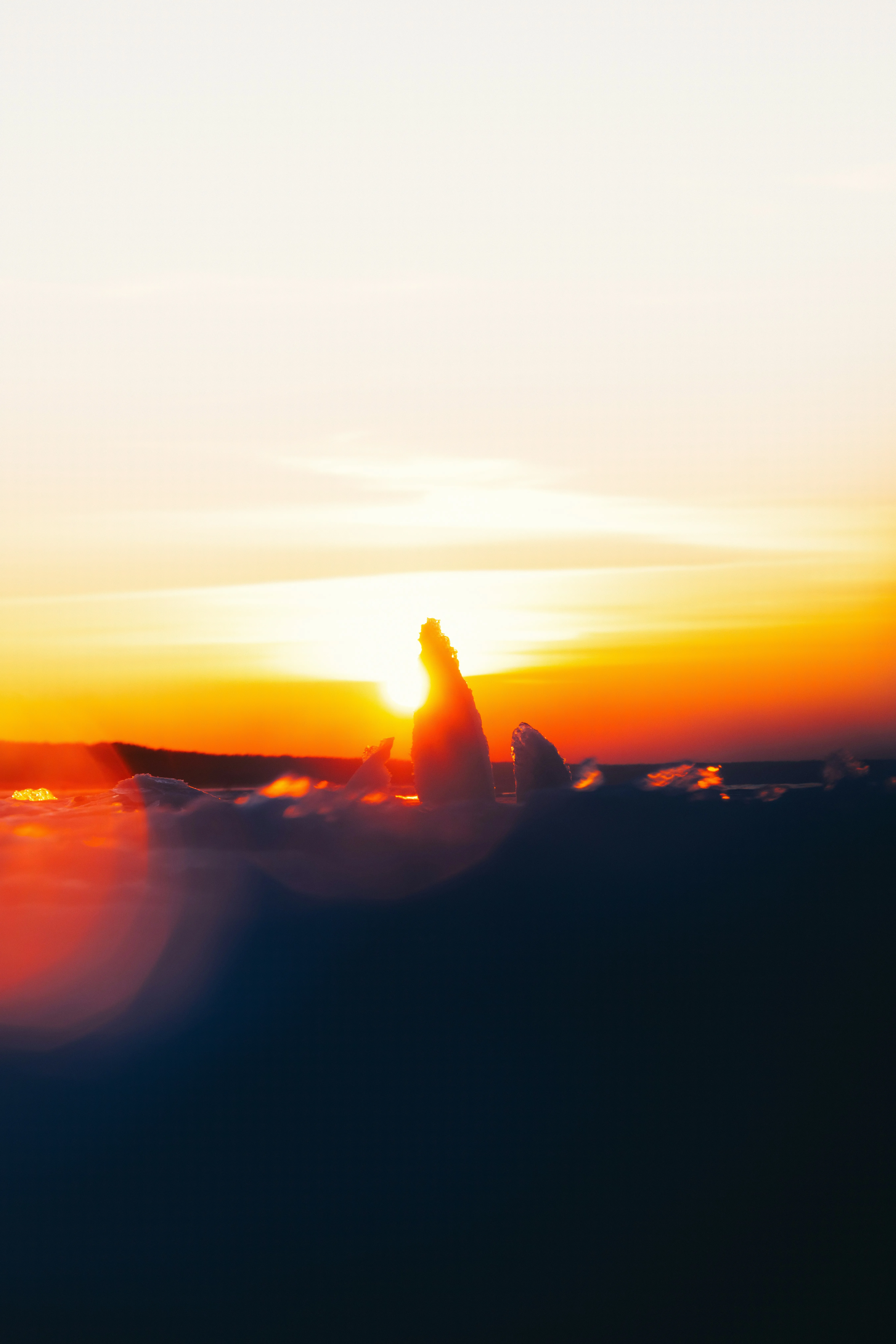 Dramatic Sunset Glow: Clouds Kissed by Fiery Light