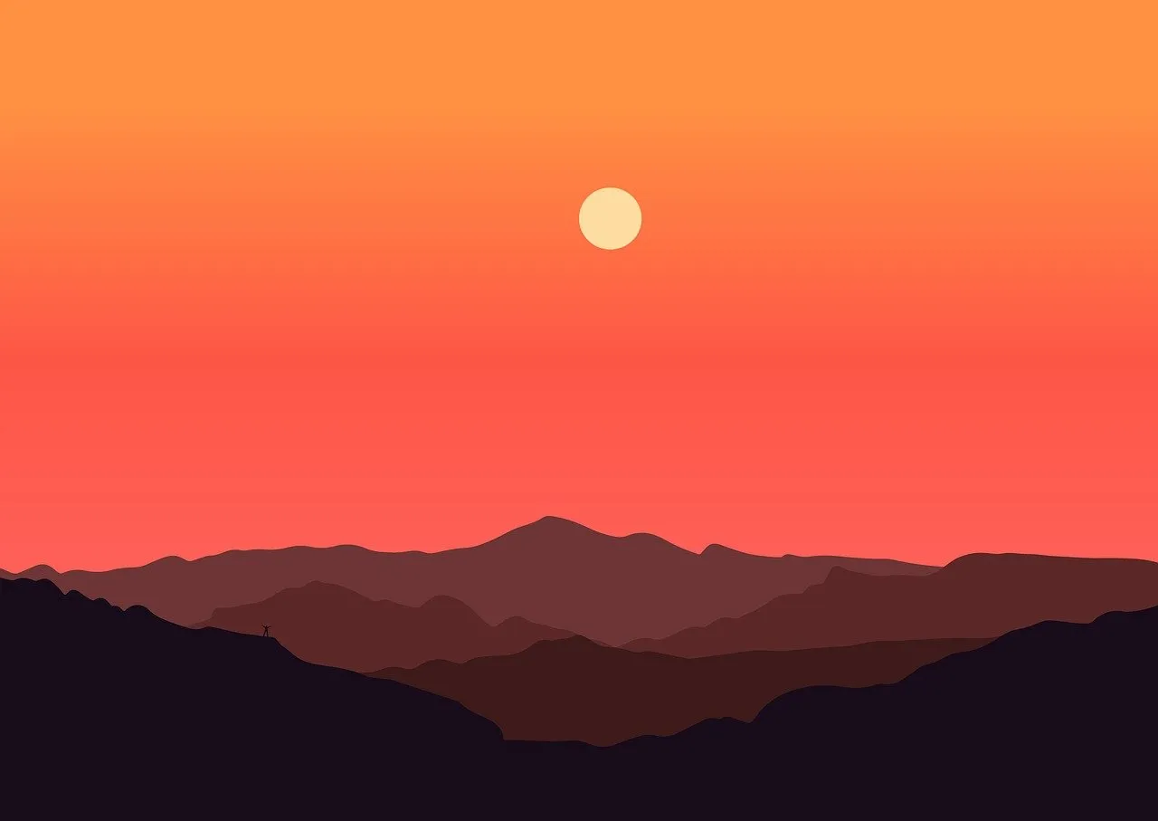 Breathtaking Sunset over Layered Autumn Mountains