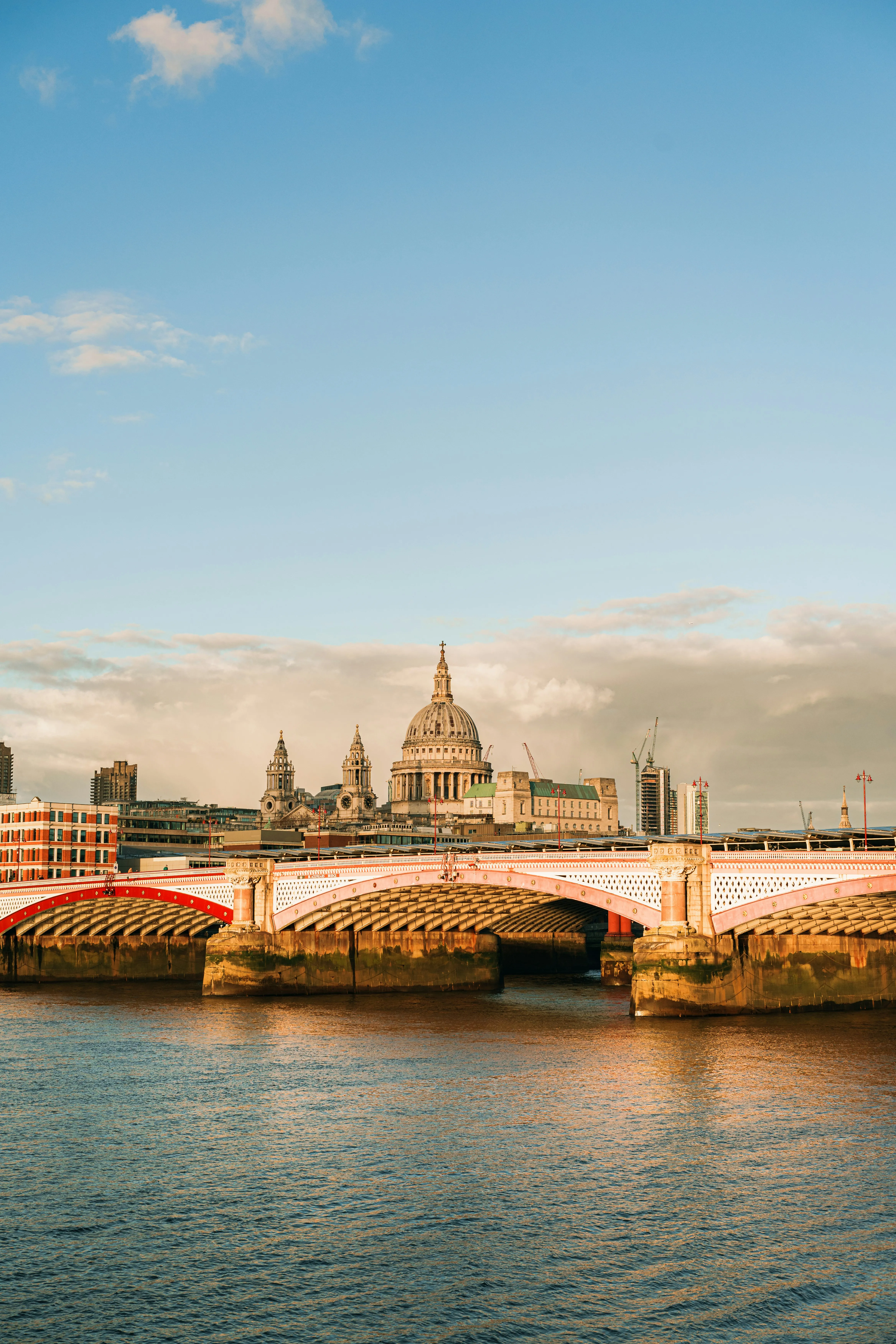Iconic London Vista: St. Paul's & Millennium Bridge at Sunset